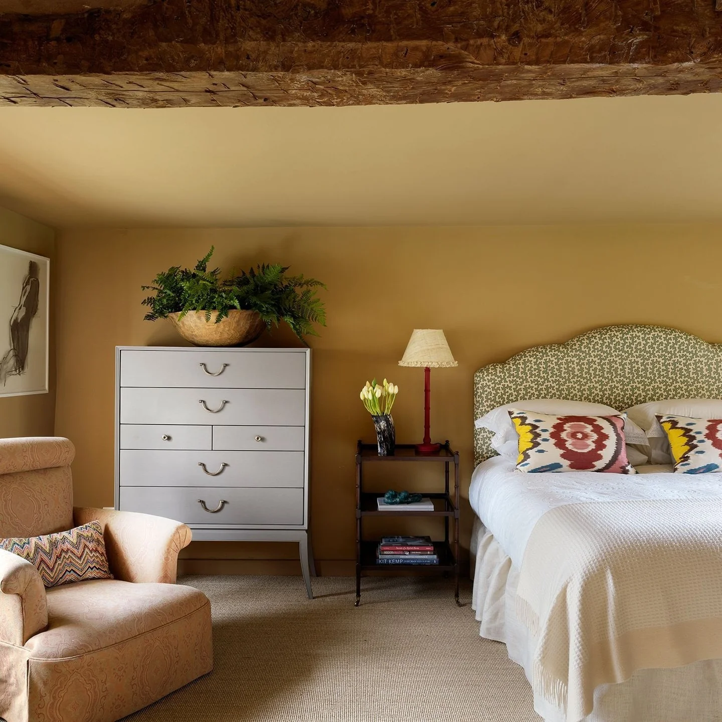 13. Country Bedroom with Mustard Ochre Walls and Patterned Textiles (Country Style Bedroom Ideas)