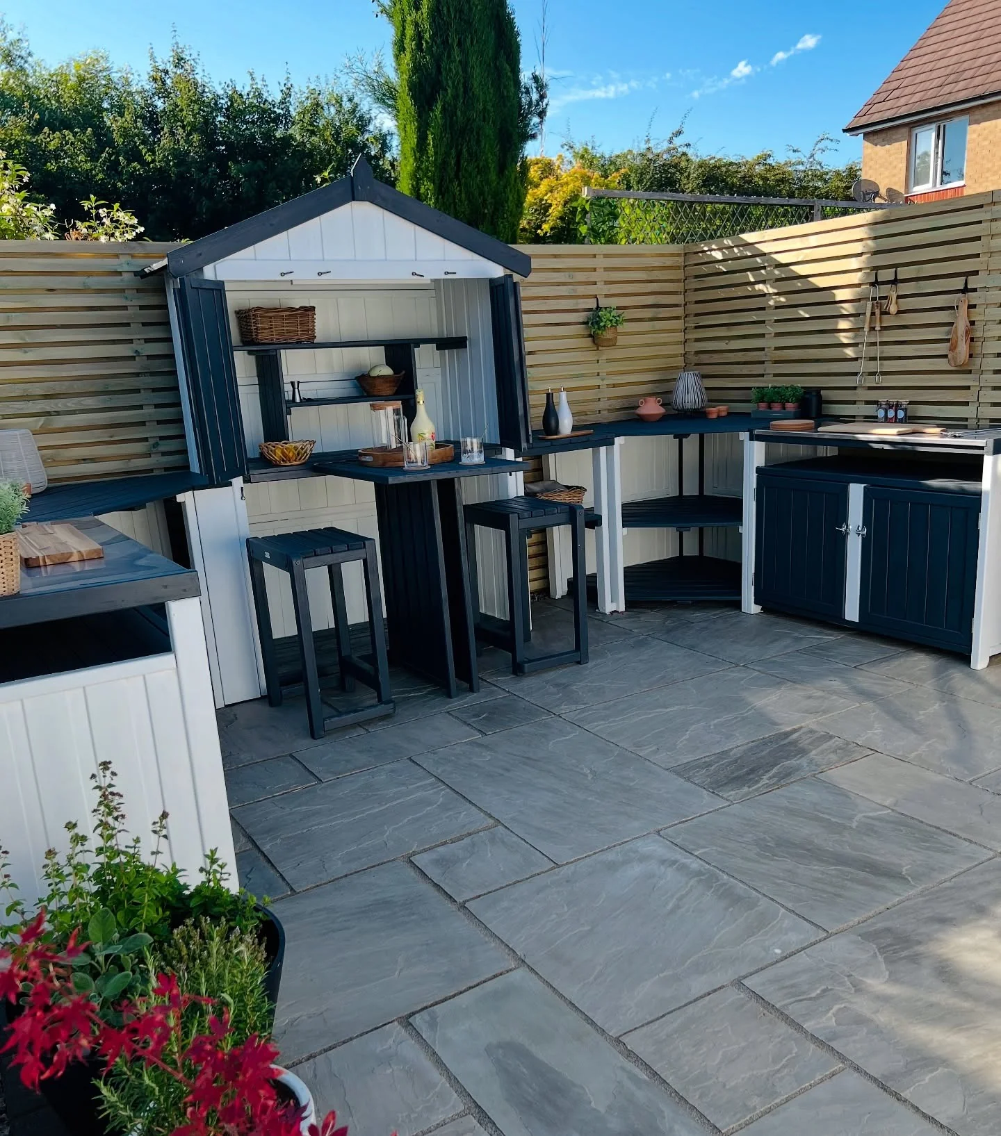 15. DIY-Style Outdoor Kitchen Corner in Navy Blue, White & Natural Wood (Small Outdoor Kitchen Ideas)