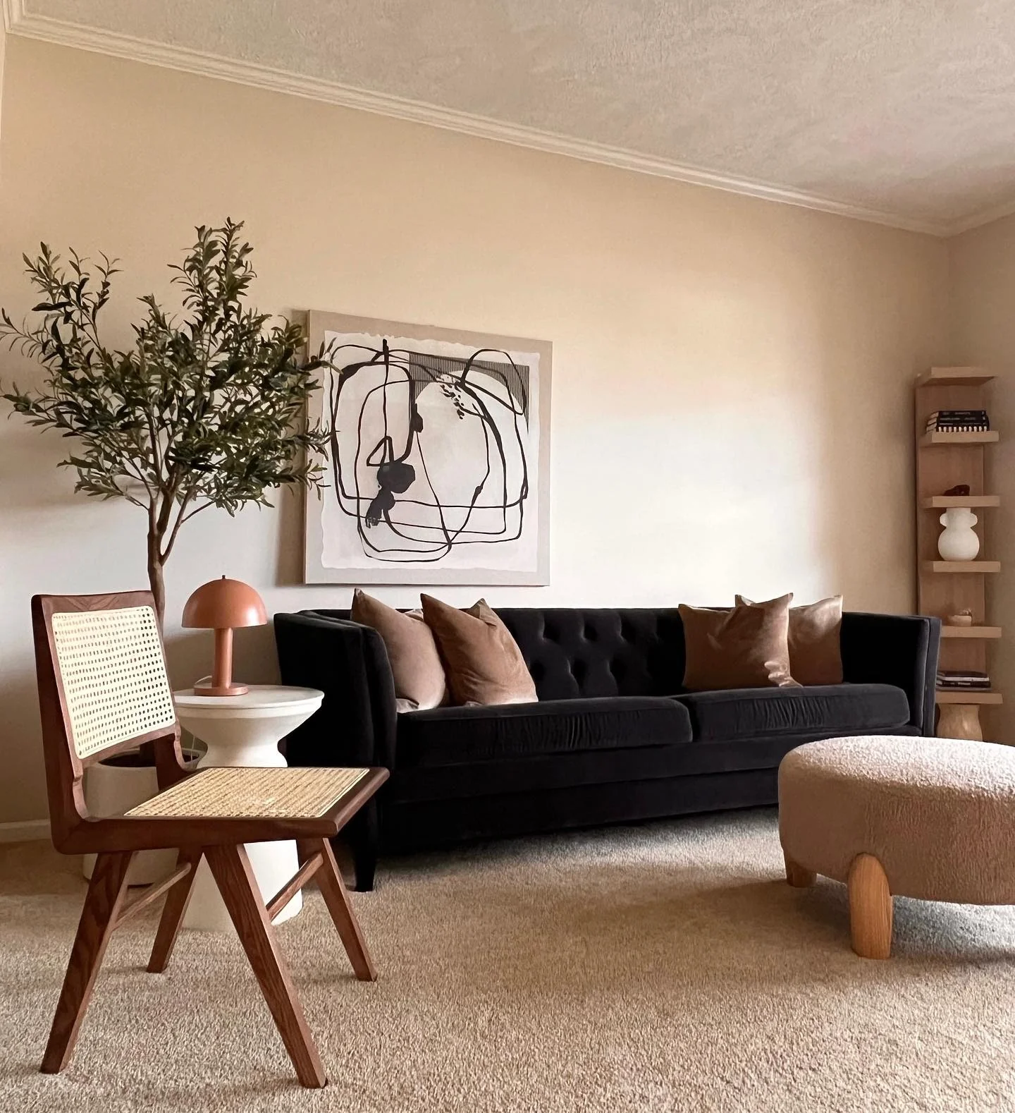 9. Black Sofa with Camel & Walnut Mid-Century Styling (Dark Sofa Living Room Ideas)