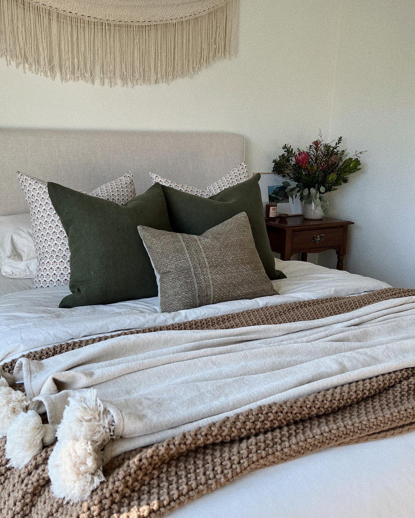 8. Neutral Bedroom with Botanical Accents and Soft Contrast (Natural Bedroom Ideas)