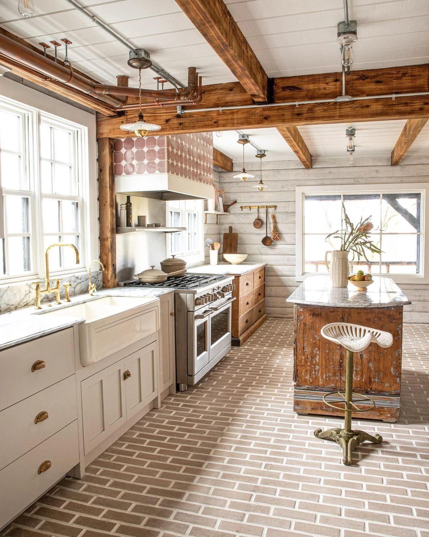 13. White and Weathered Wood Kitchen with Brick Flooring (Log House Kitchen Ideas)
