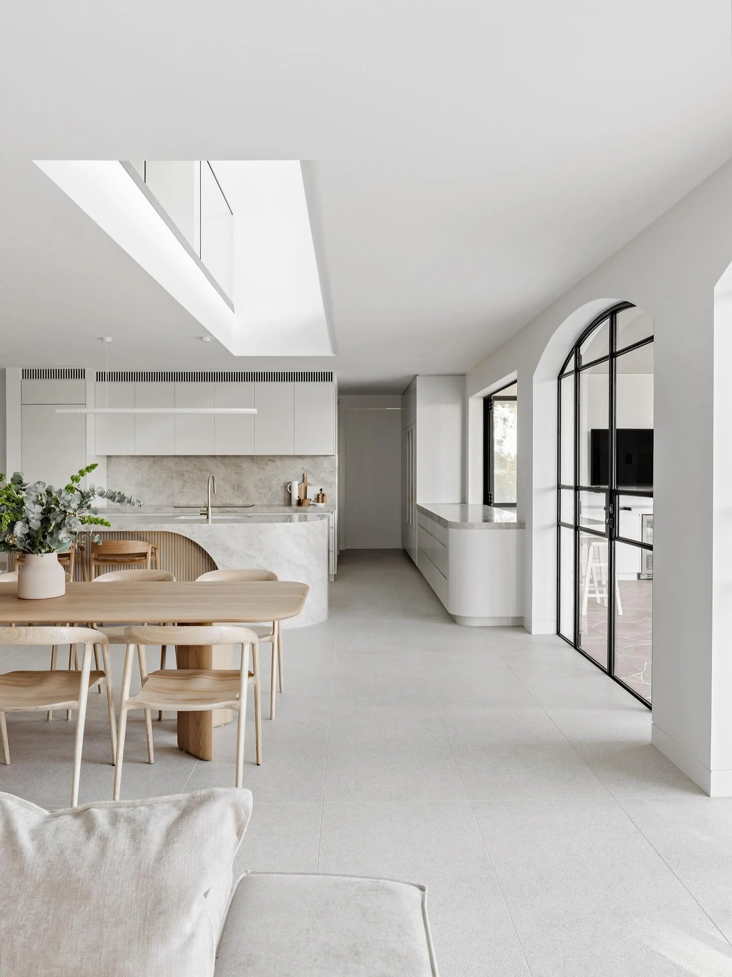 2. Minimal White and Oak Kitchen with Light Porcelain Floors (White Floor Kitchen Ideas)
