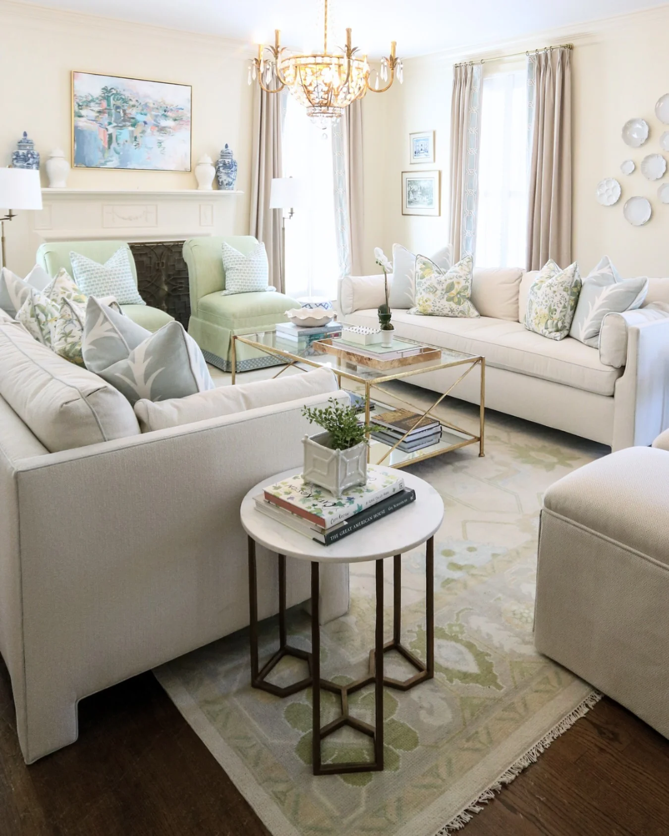 5. Soft Coastal Elegance in Cream + Brass + Pale Green (Luxury Living Room Ideas)
