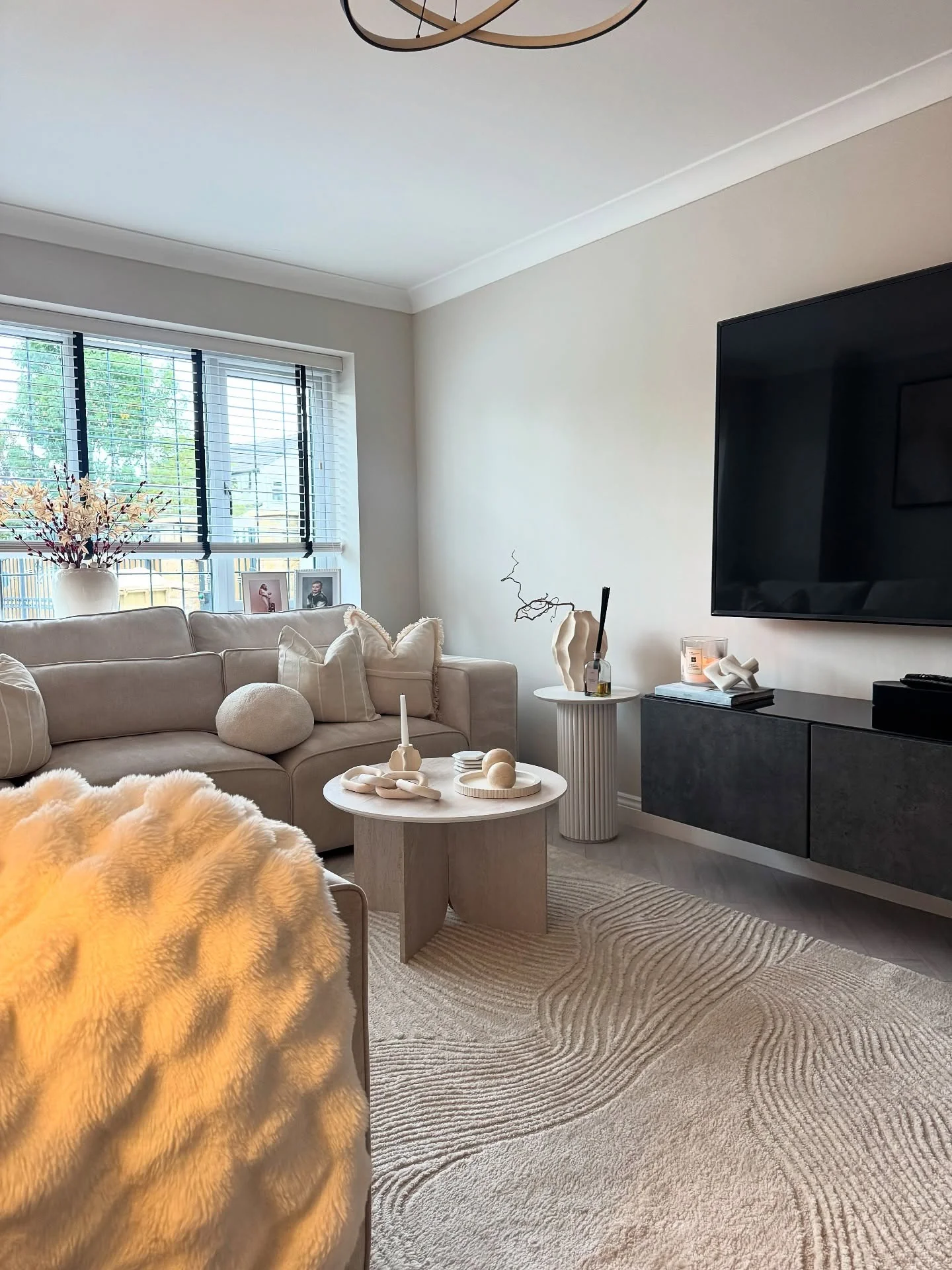 8. Scandi-Inspired Neutral Living Room in Oatmeal + Ivory + Matte Black (Luxury Living Room Ideas)