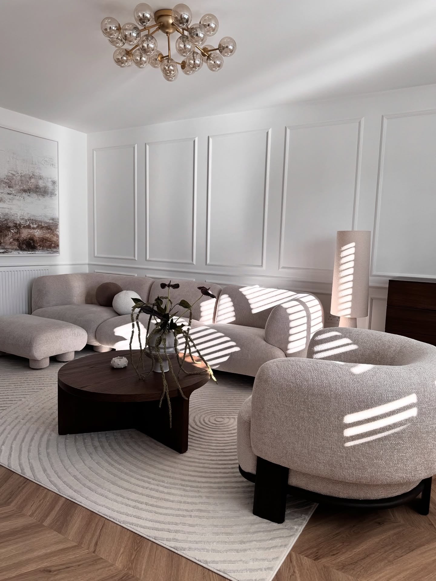 14. Modern Panel Molding Elegance in Soft White + Taupe + Brass (Luxury Living Room Ideas)