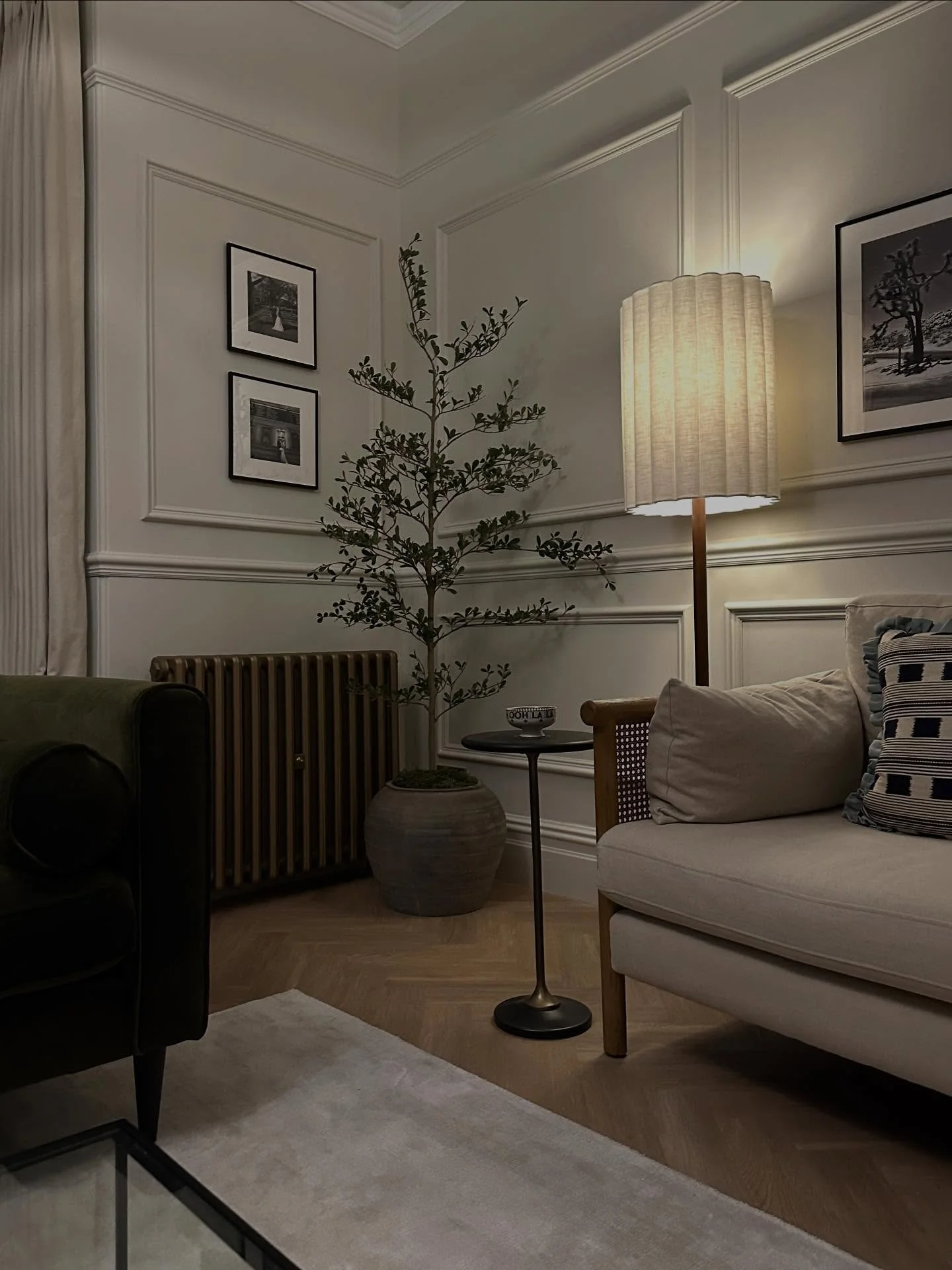 14. Traditional Cream Paneling with Espresso and Brass Details (Cream and Brown Living Room Ideas)