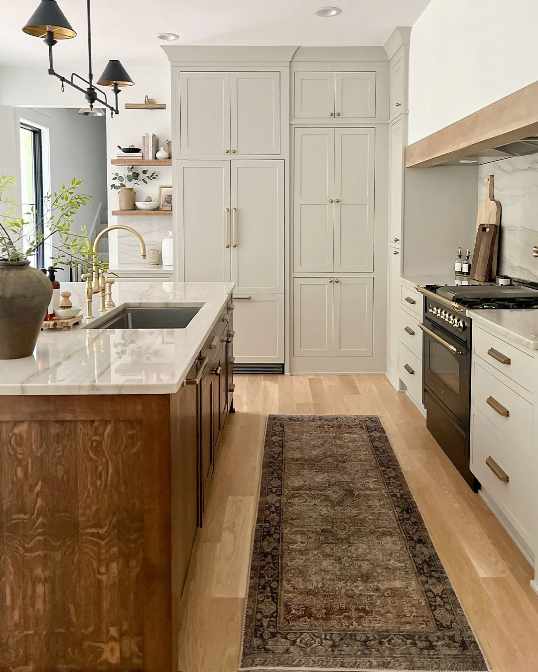 6. Cream Cabinets + Aged Brass Hardware + Warm Wood Island (Oat + Honey Palette) (Earthy Kitchen Ideas)
