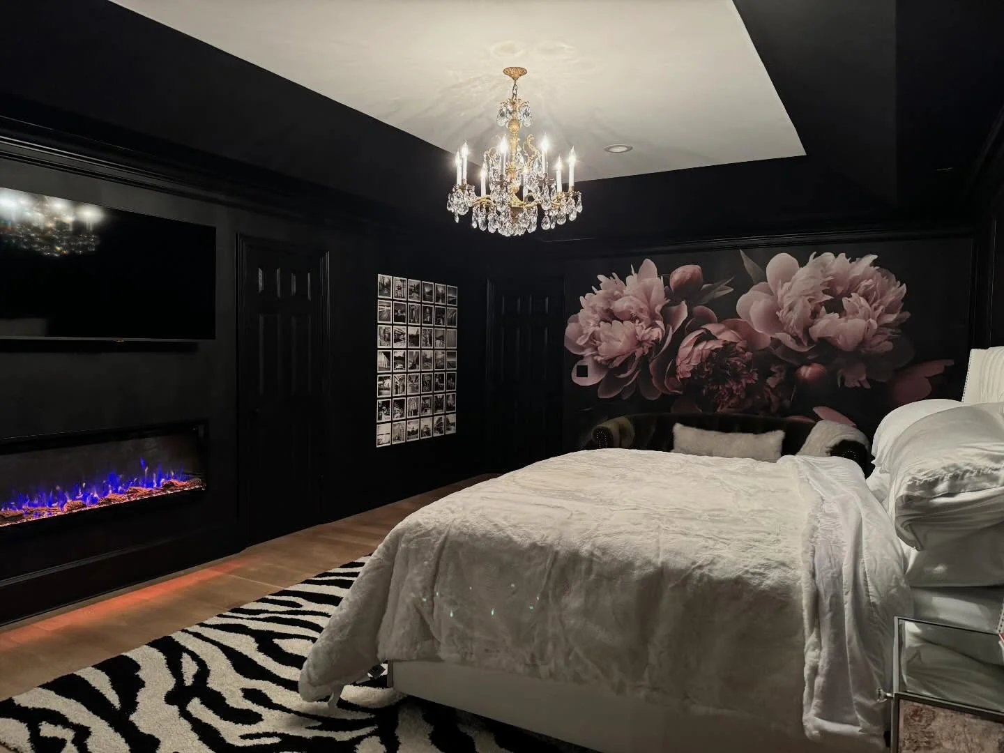 10. Black Bedroom with Floral Mural + Luxe Lighting (All Black Bedroom Ideas)