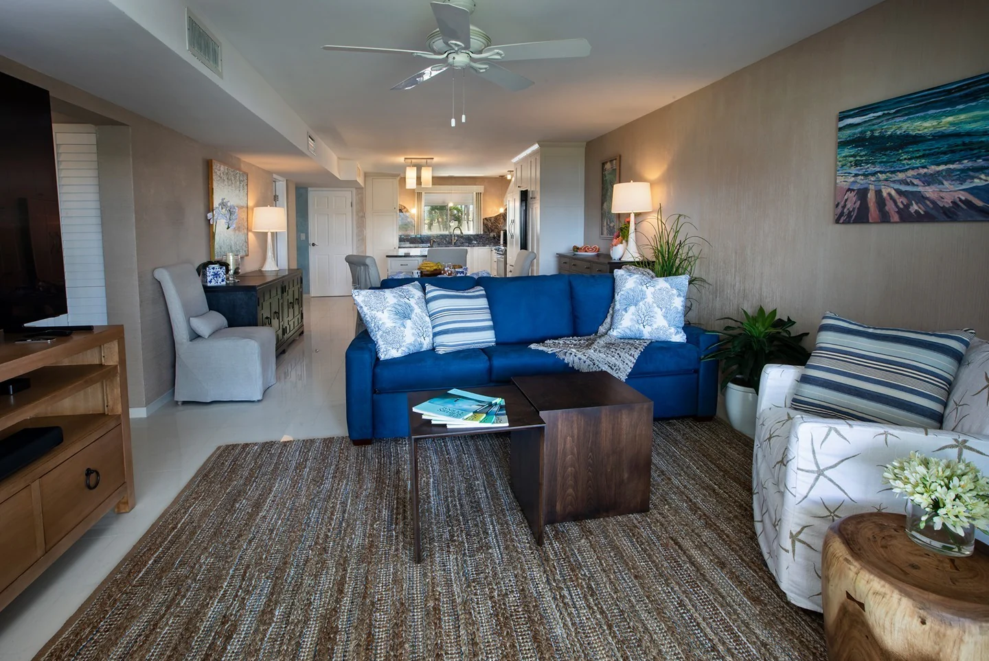 4. Coastal Contemporary Styling with Royal Blue + Sand + White (Royal Blue Sofa Living Room Ideas)