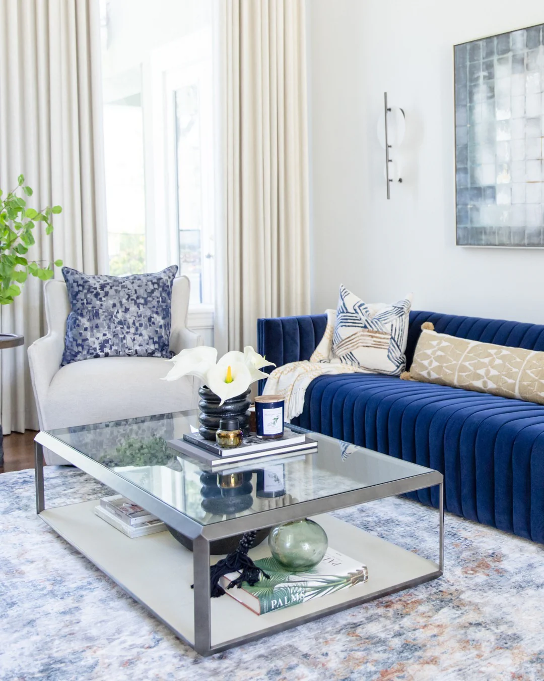 13. Airy Modern Glam with Royal Blue + Cream + Navy Patterns (Royal Blue Sofa Living Room Ideas)