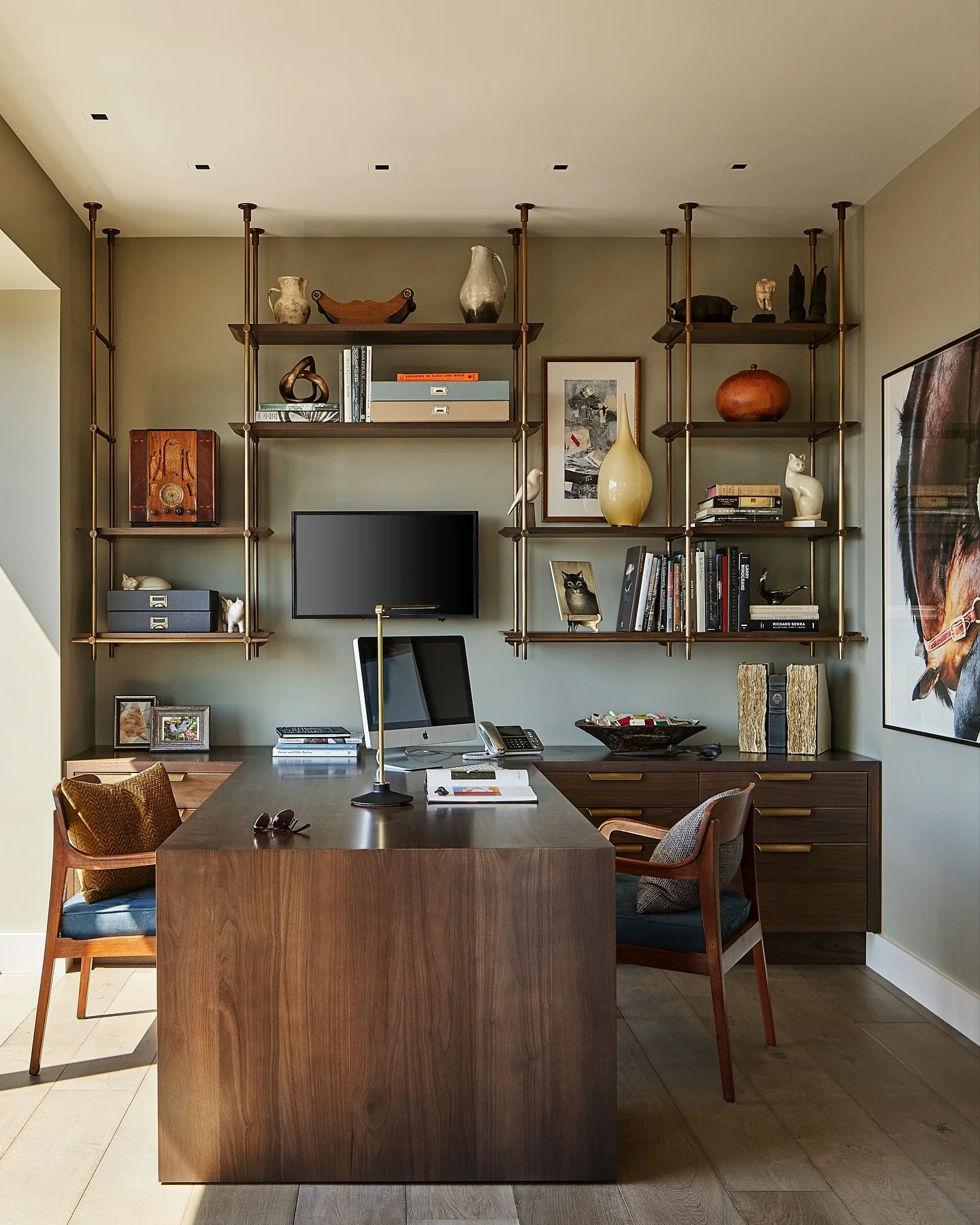 10. Layered Home Office with Floating Shelves and Warm Woods (Elegant Office Ideas)