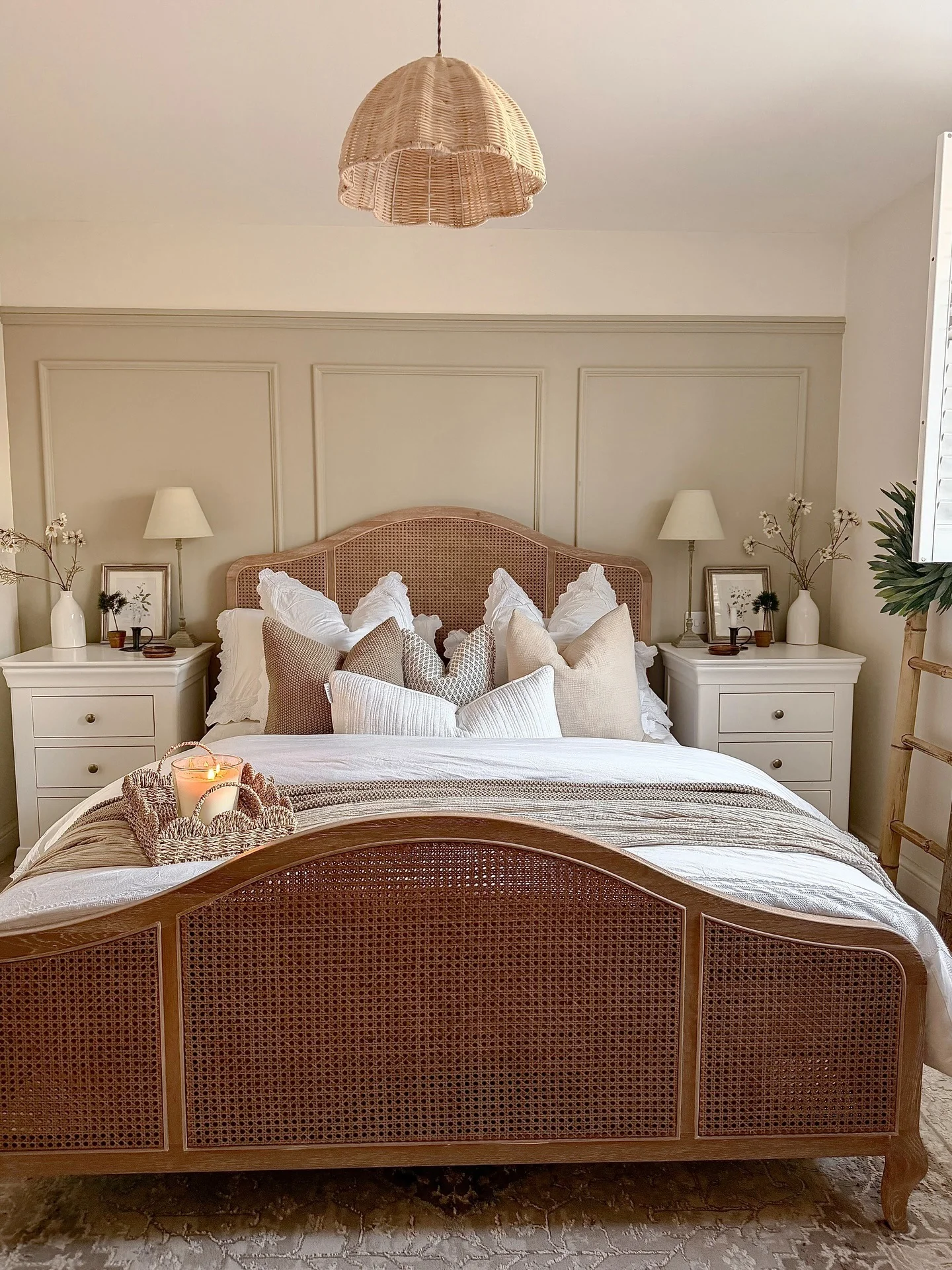 5. French-Inspired Warm Neutrals with Cane Details (Expensive Looking Bedroom Ideas)
