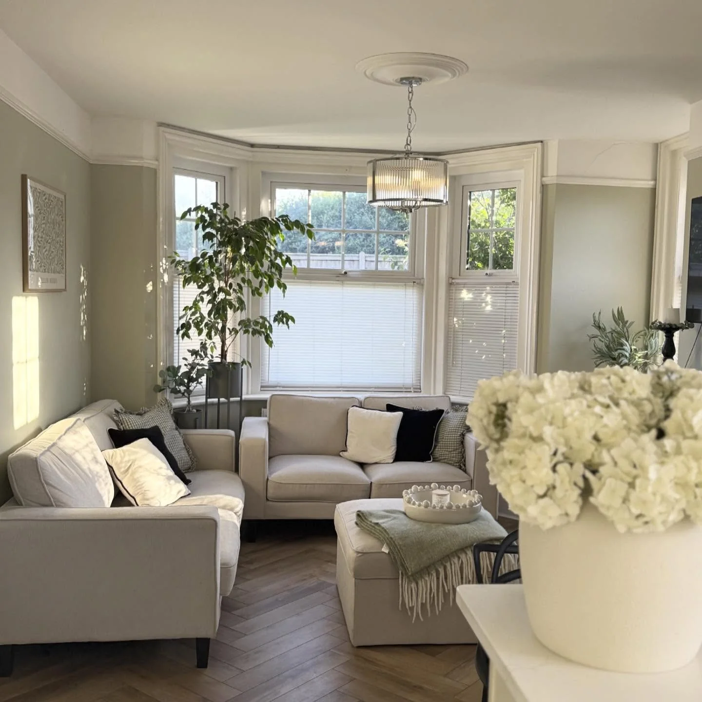 4. Cozy Bay Window Lounge in Sage and Soft Beige (Lounge Living Room Ideas)