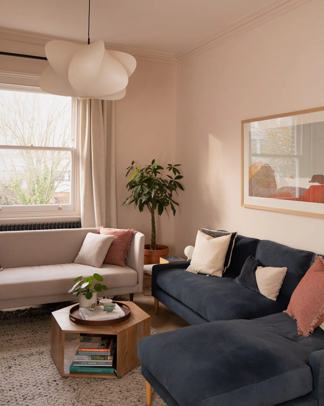 5. Contemporary Lounge in Blush, Navy, and Natural Wood (Lounge Living Room Ideas)