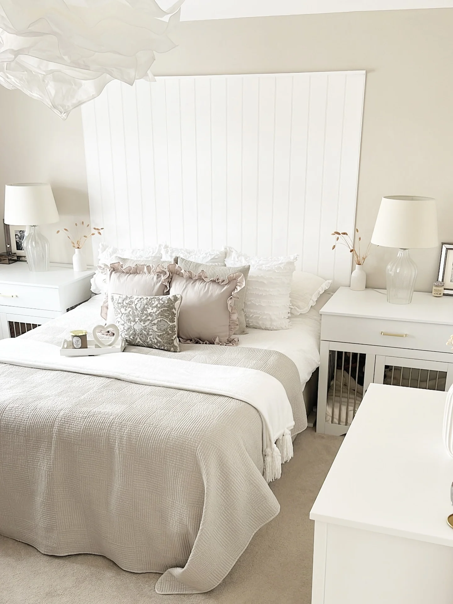 3. White Panel Bed with Neutral Layered Textiles (White Furniture Bedroom Ideas)