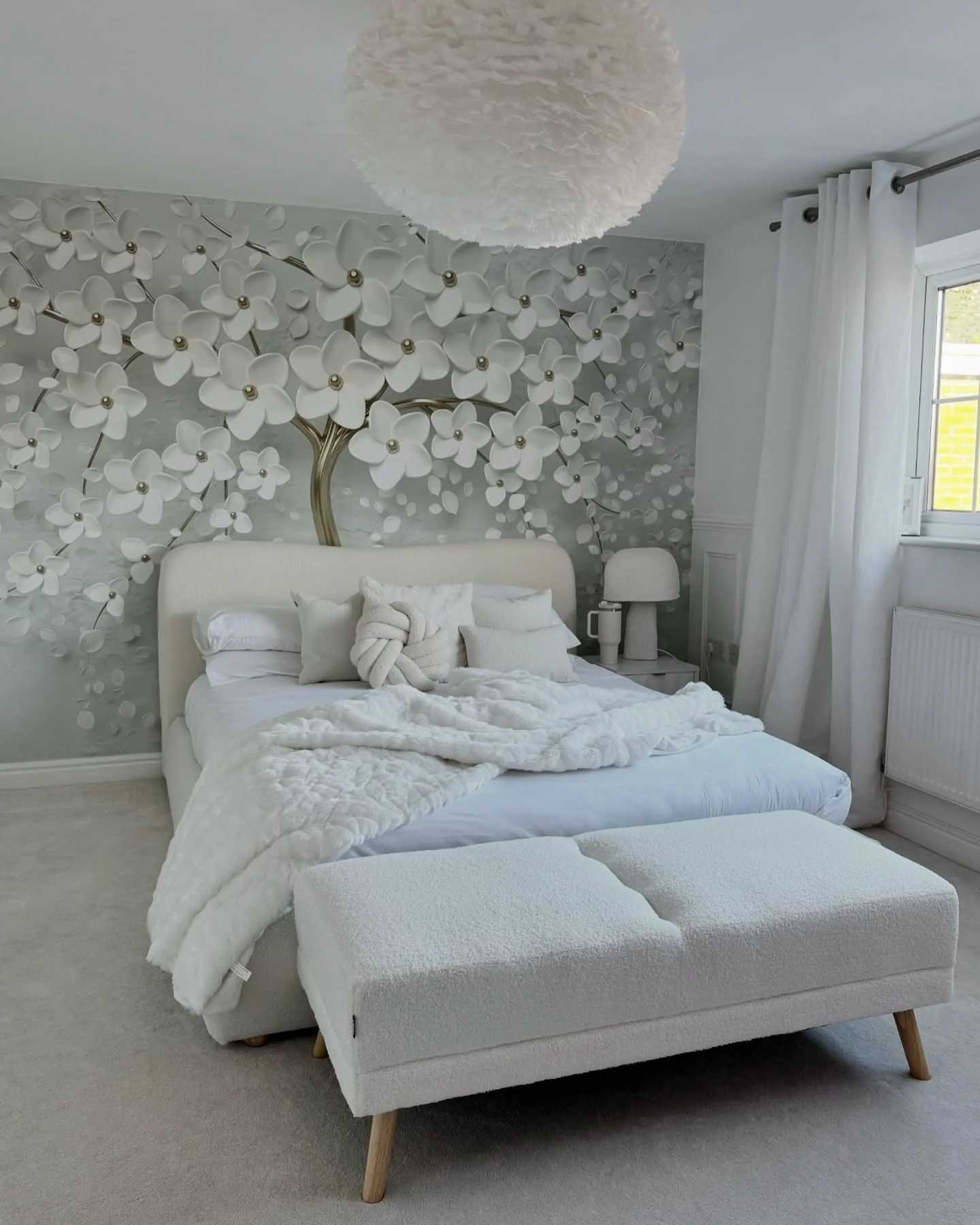4. White Upholstered Bed with Statement Floral Wall Mural (White Furniture Bedroom Ideas)