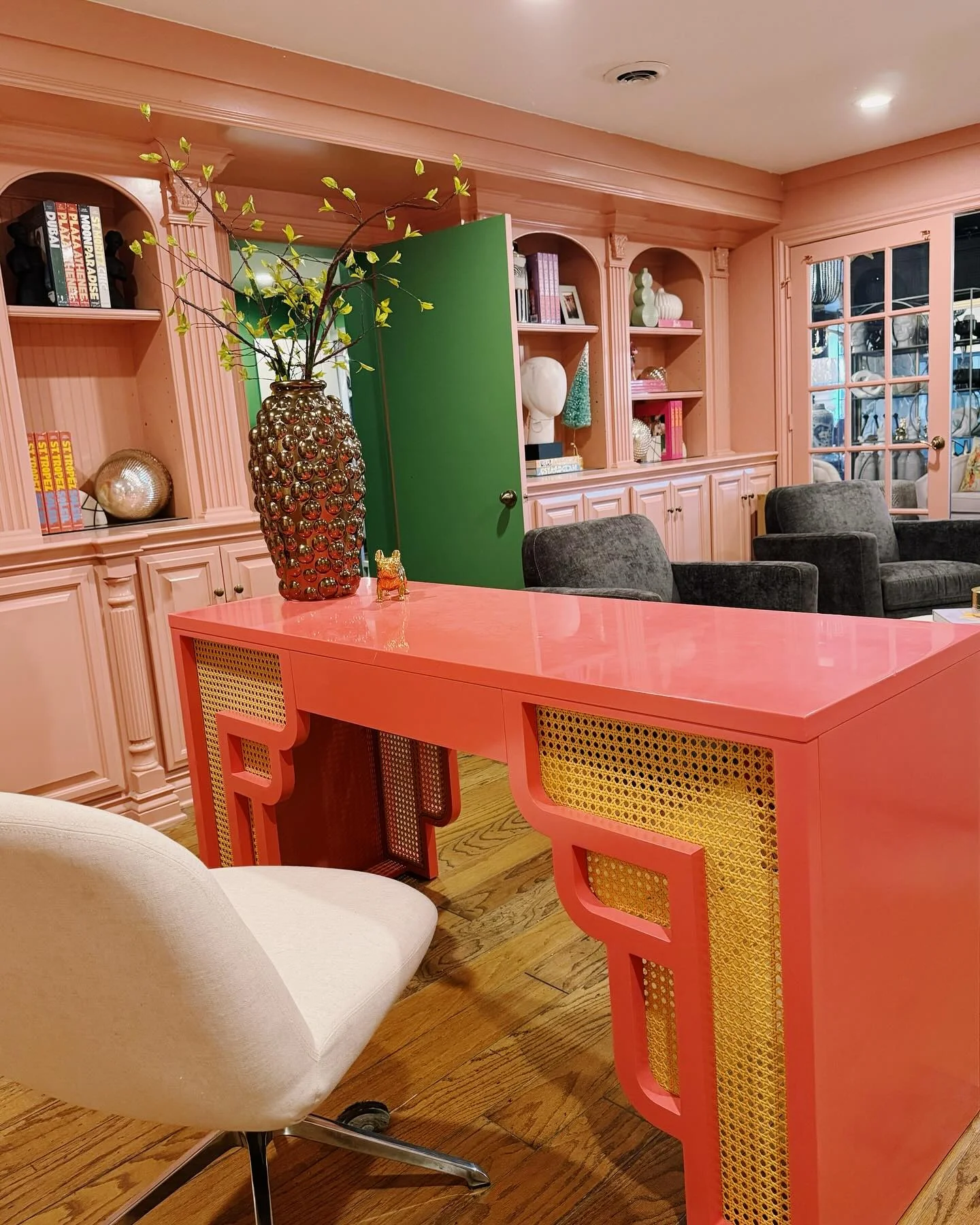 2. Playful Coral Office with Graphic Details (Colorful Office Ideas)