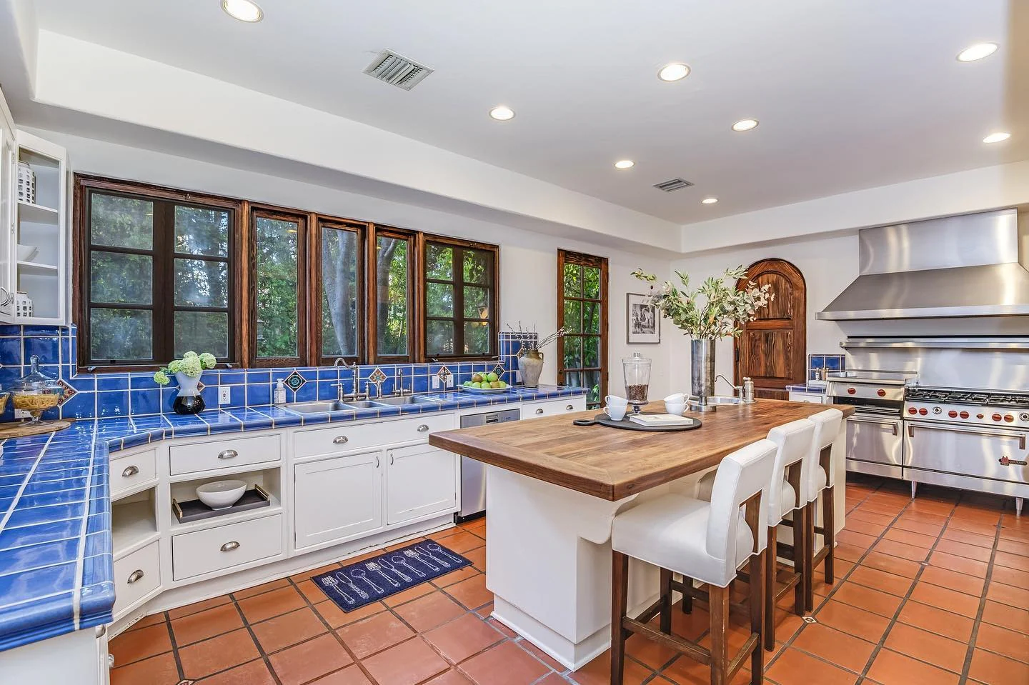 10. Spanish Kitchen with Blue Tile Countertops (Spanish Style Kitchen Ideas)