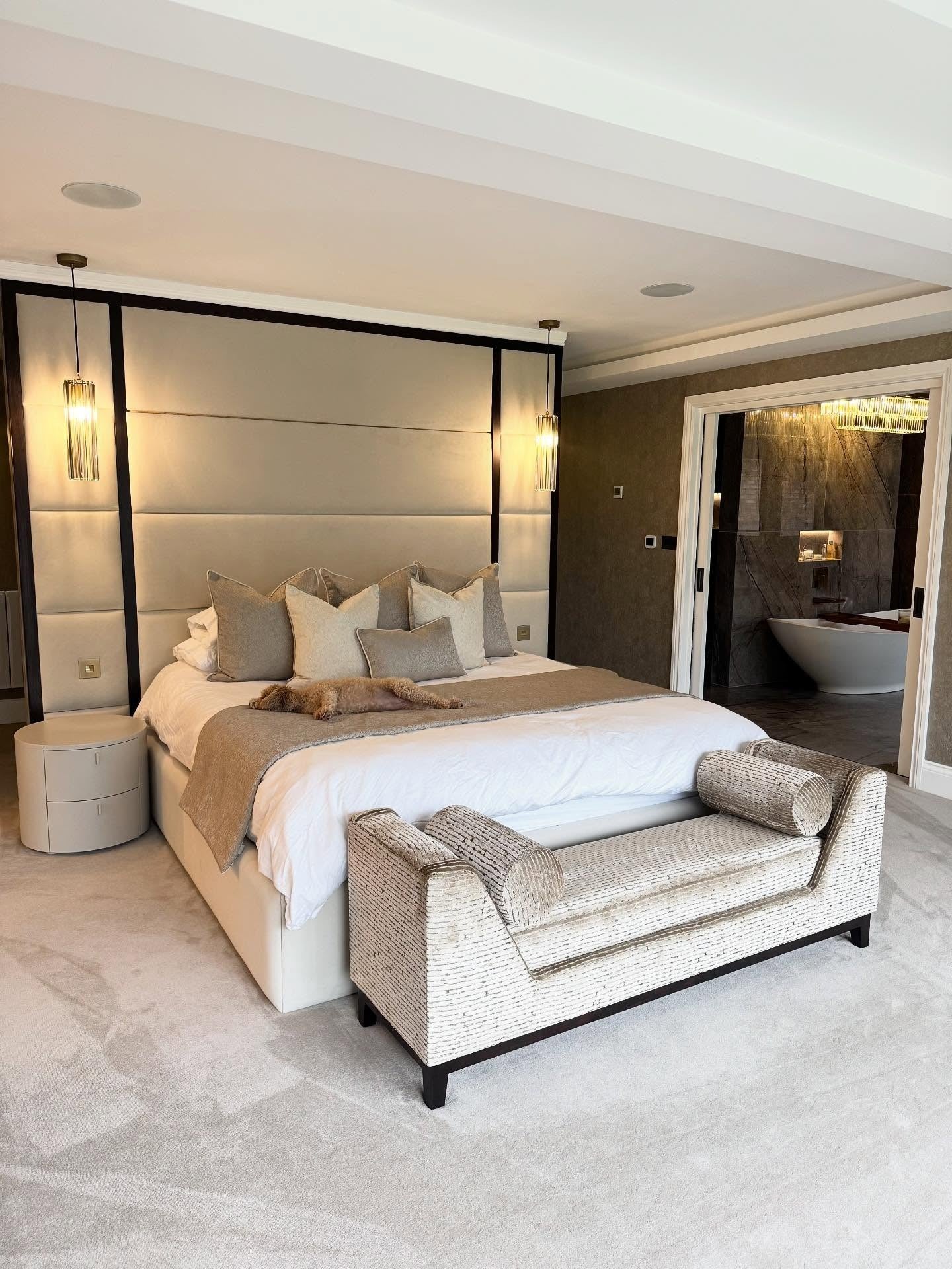 13. Upholstered Panel Wall in Warm Stone Tones (Accent Wall in Bedroom Ideas)