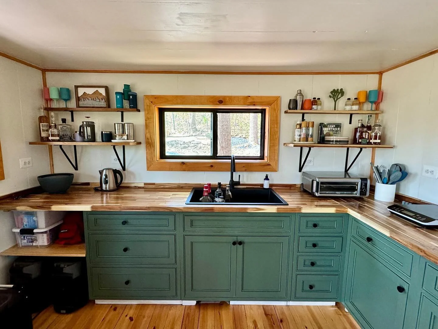 13. Cozy Cabin Kitchen with Sage Green Cabinets and Butcher Block (Cabin Kitchen Ideas)