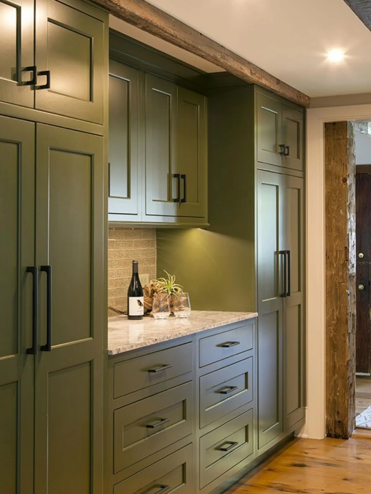 8. Deep Green Tall Cabinetry with Rustic Accents (Tall Kitchen Cabinets Ideas)