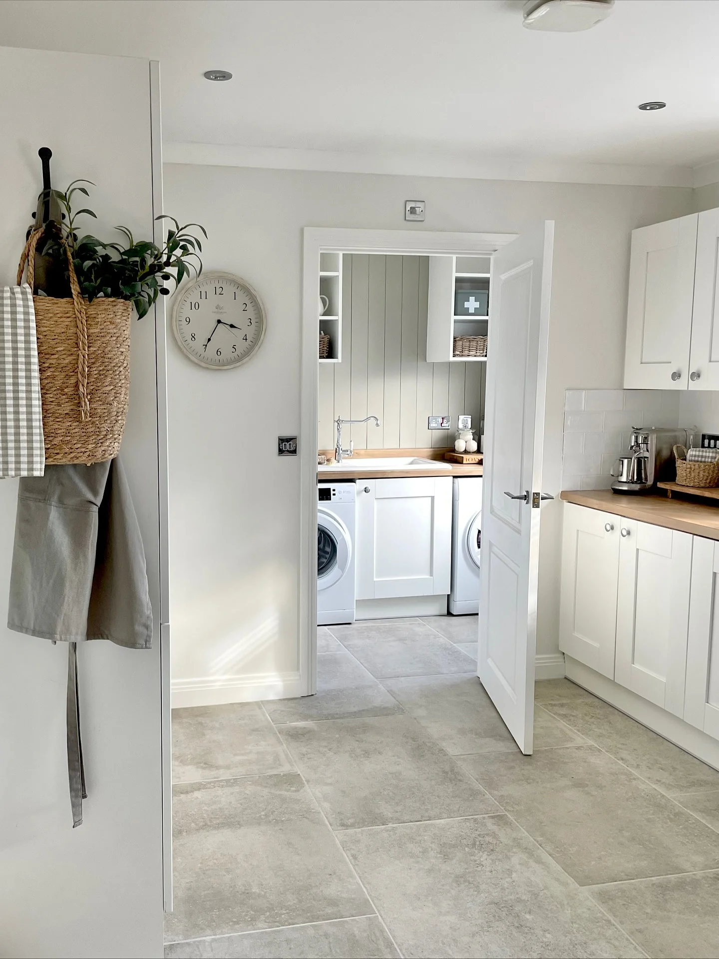 8. Grey Floor Tiles Connecting Kitchen and Utility Spaces (Grey Floor Kitchen Ideas)