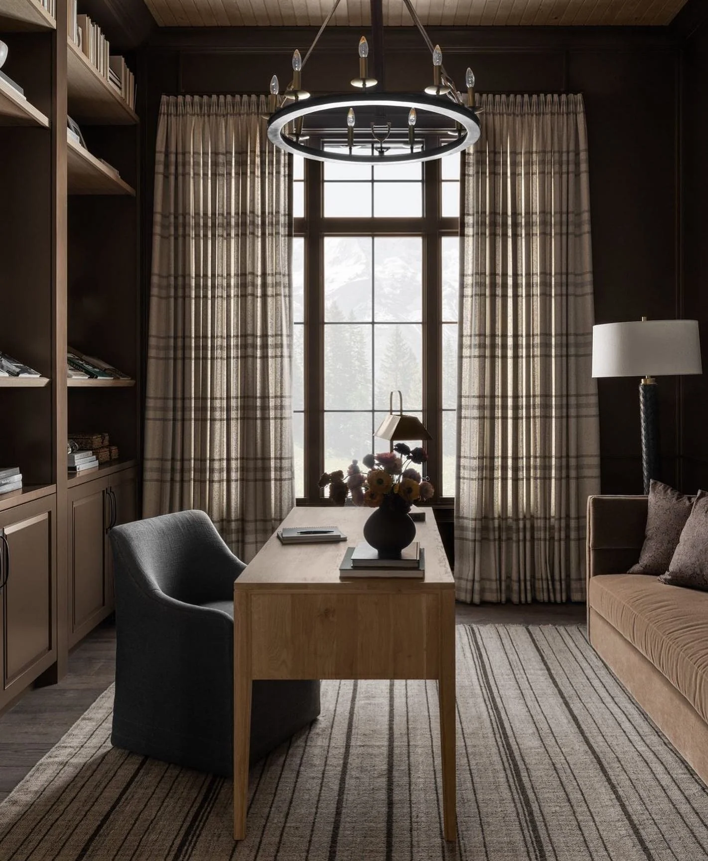 7. Dark Wood Library Office with Soft Layered Lighting (Moody Office Ideas)