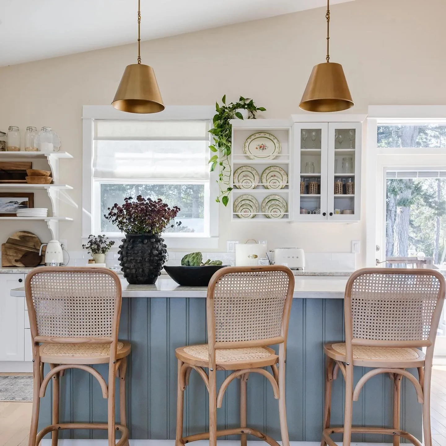 16. Blue-Gray Island with Cane Seating and Brass Pendants (Coastal Kitchen Ideas)