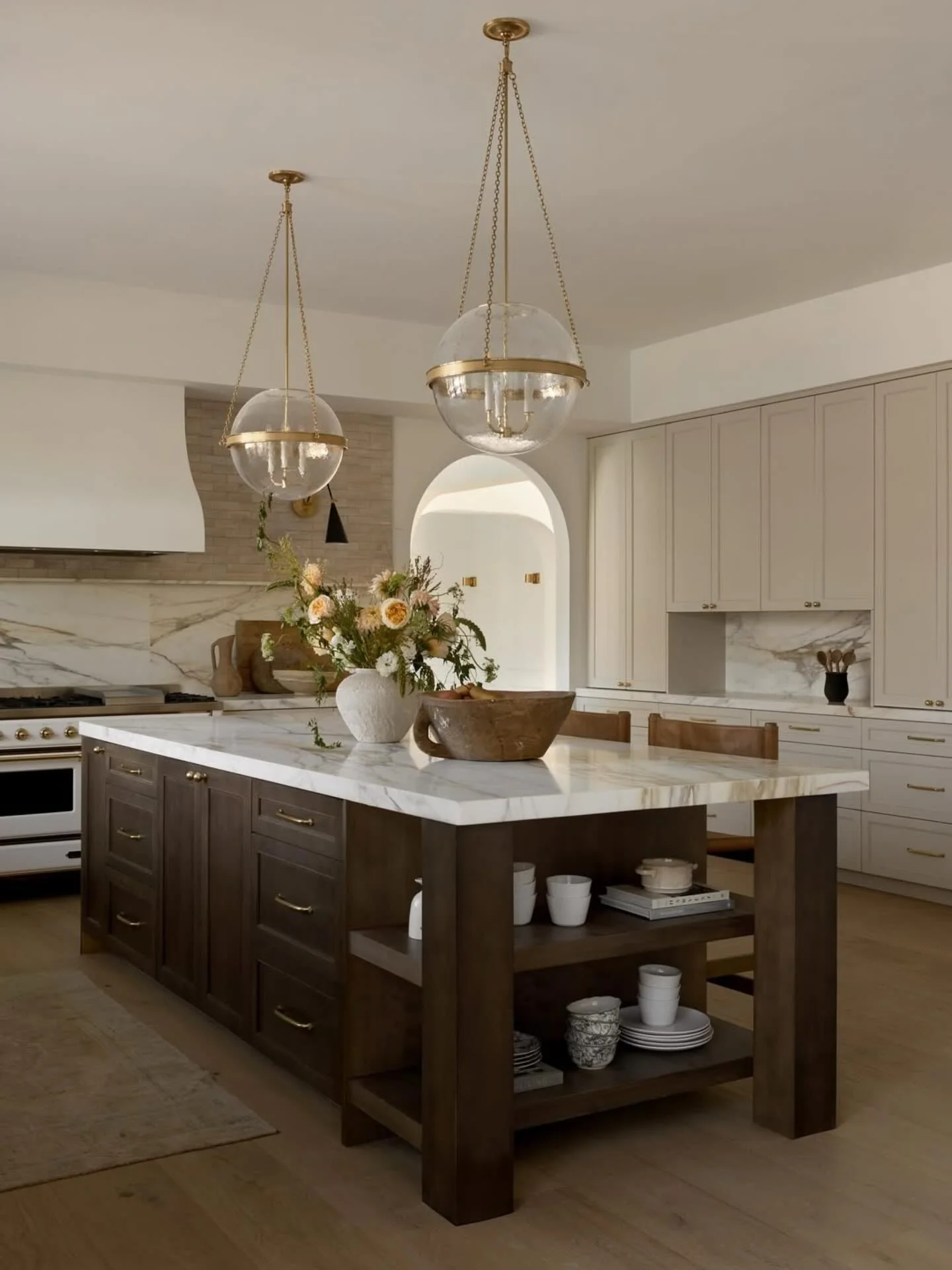 7. Refined Transitional Kitchen with Mixed Finishes (High Ceiling Kitchen Ideas)