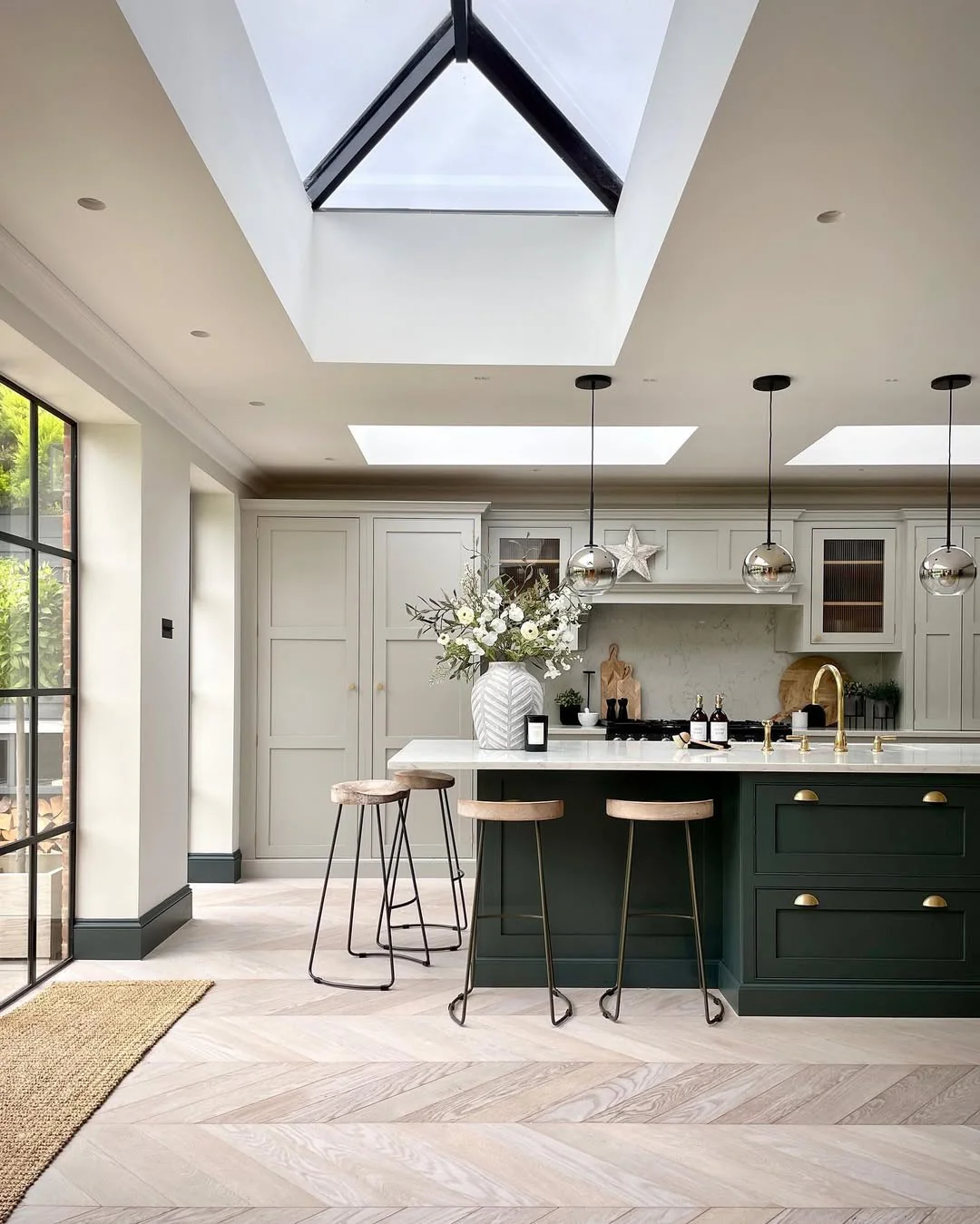 10. Contemporary Green Kitchen with Skylight Emphasis (High Ceiling Kitchen Ideas)