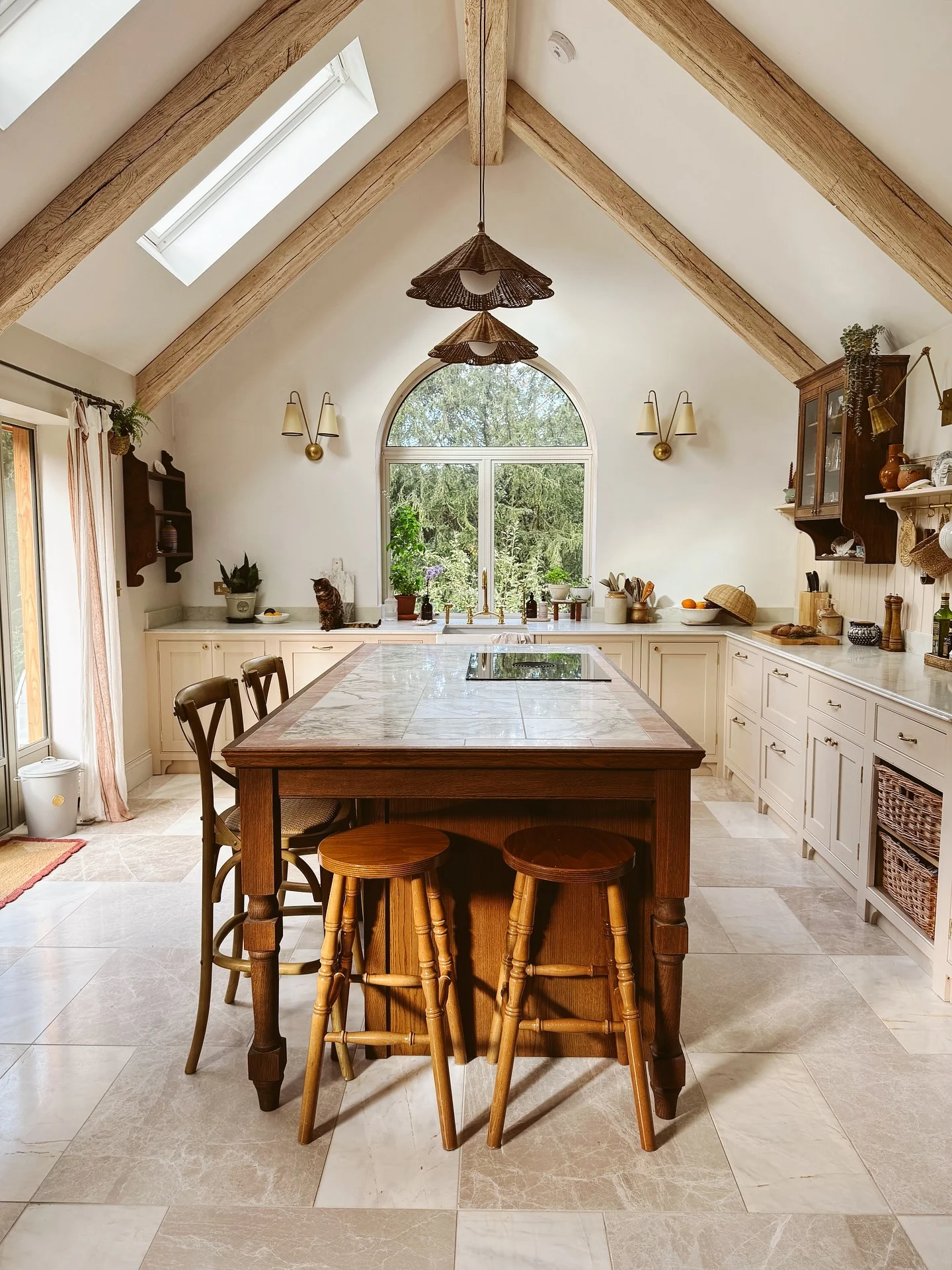 11. Rustic Cream Kitchen with Exposed Beams and Marble Island (High Ceiling Kitchen Ideas)