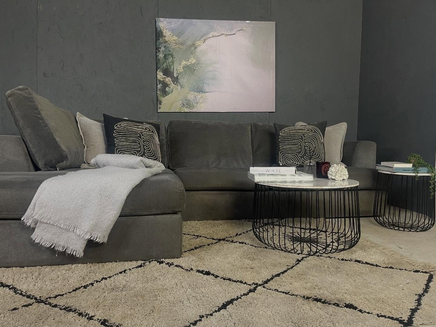 3. Moody Grey Lounge with Graphic Contrast (Grey Sofa Living Room Ideas)