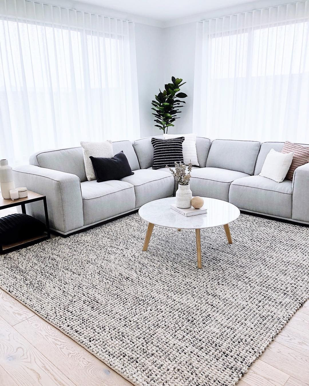 8. Soft Grey Elegance with Reflective Finishes (Grey Sofa Living Room Ideas)