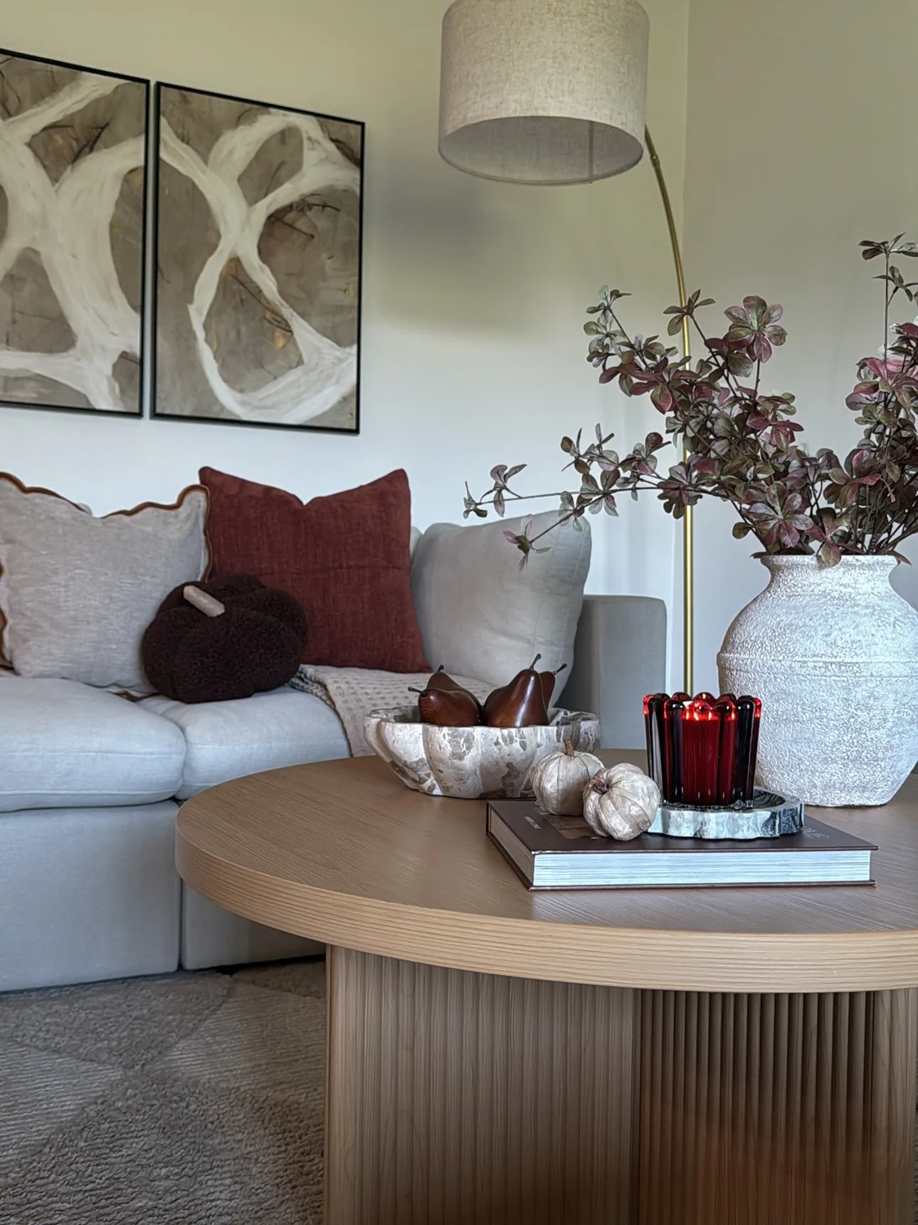 11. Soft Grey Sofa with Warm Earth Accents (Grey Sofa Living Room Ideas)