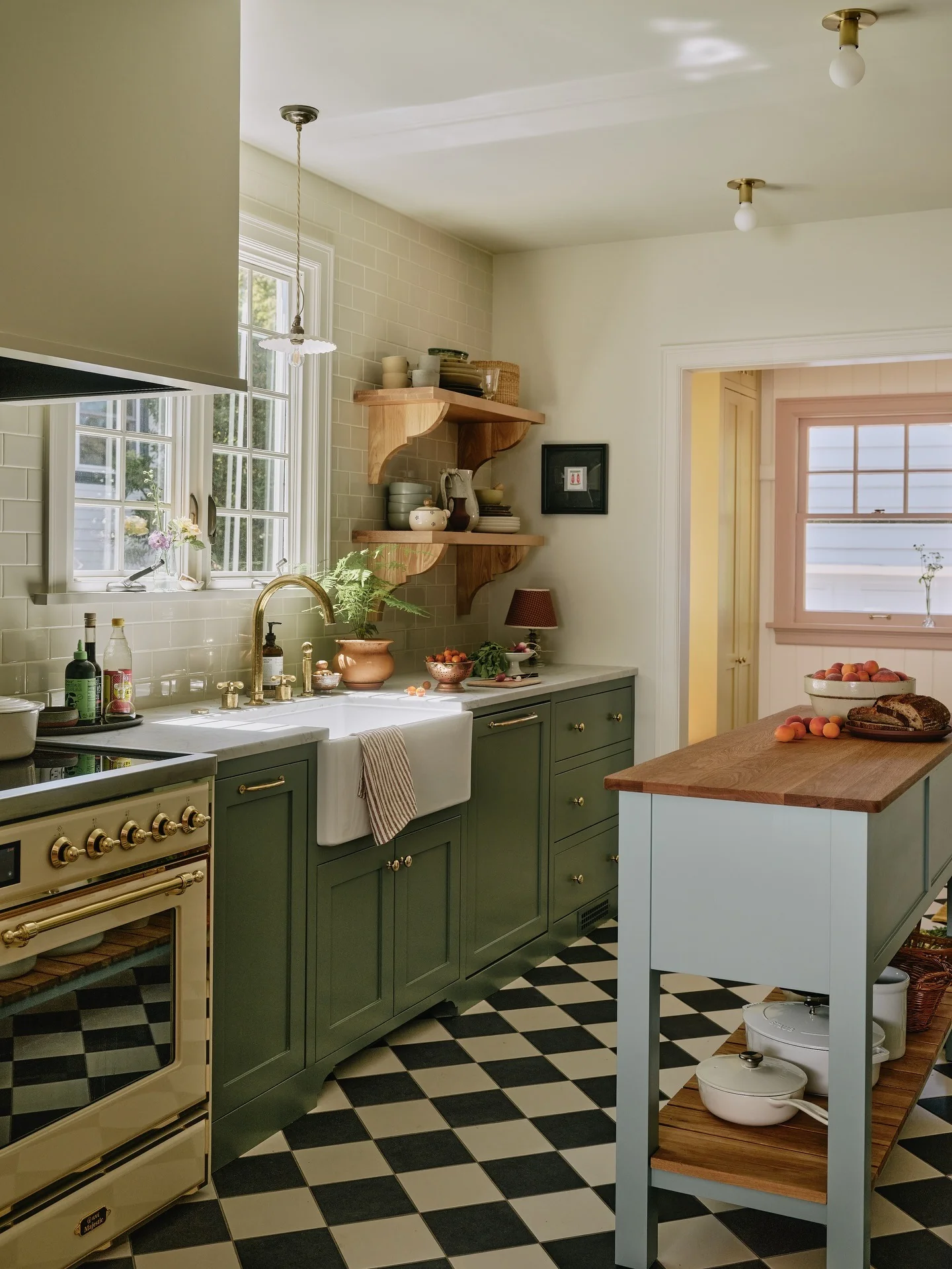 15. Traditional Green Kitchen with Checkerboard Flooring (Green and Wood Kitchen Ideas)