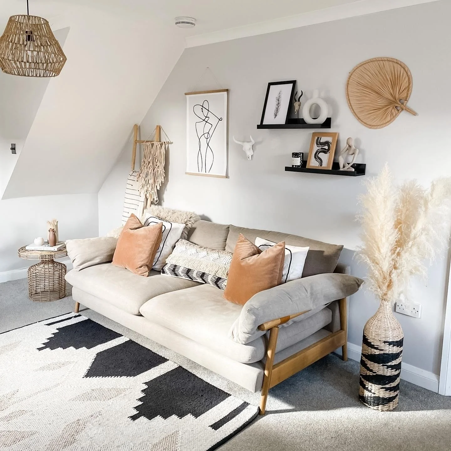 4. Cozy Minimal Living Room in Sand and Black (Minimal Living Room Ideas)