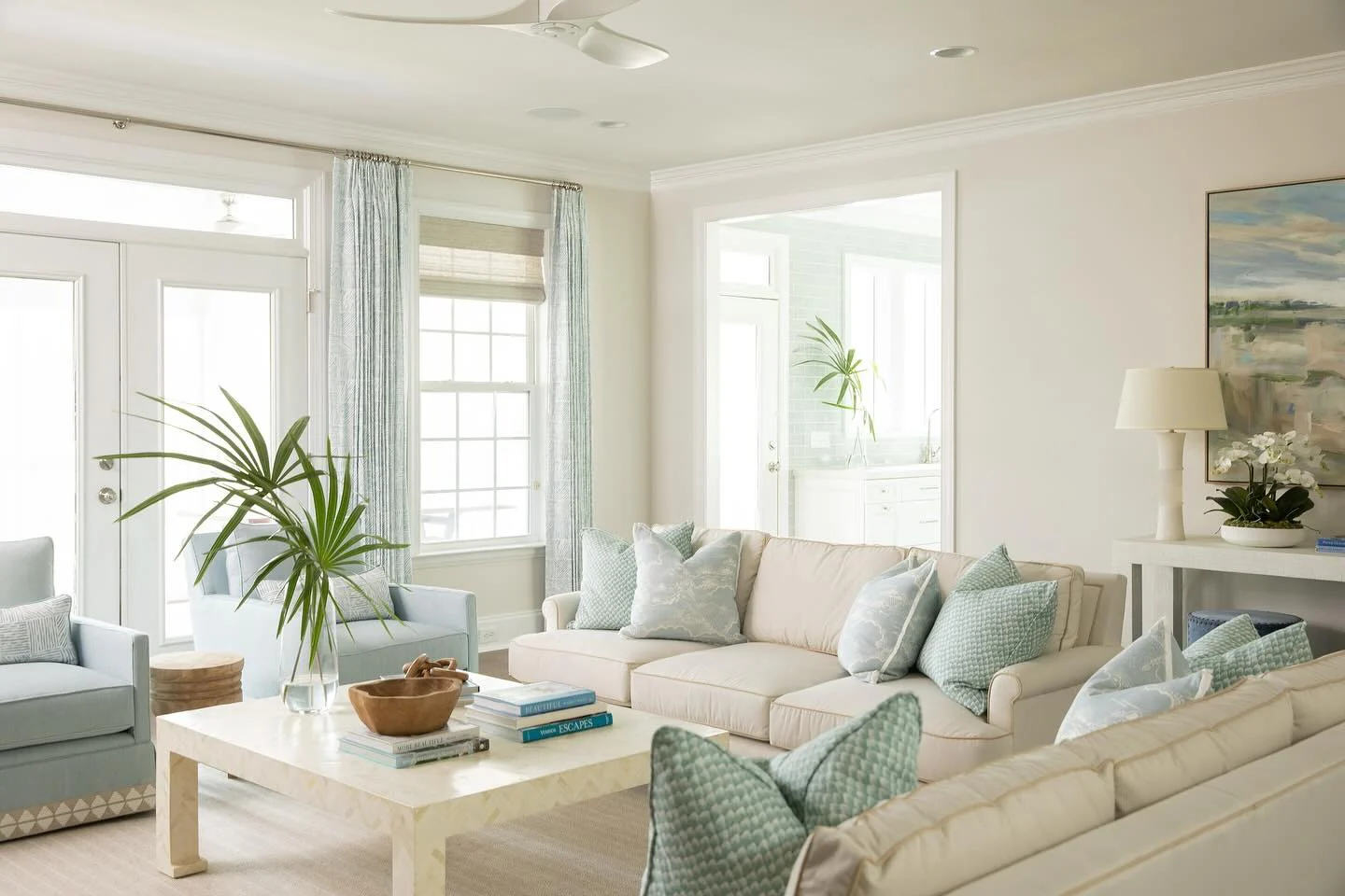 10. Bright Coastal Living Room in Cream and Sea Glass Blue (Beach Living Room Ideas)