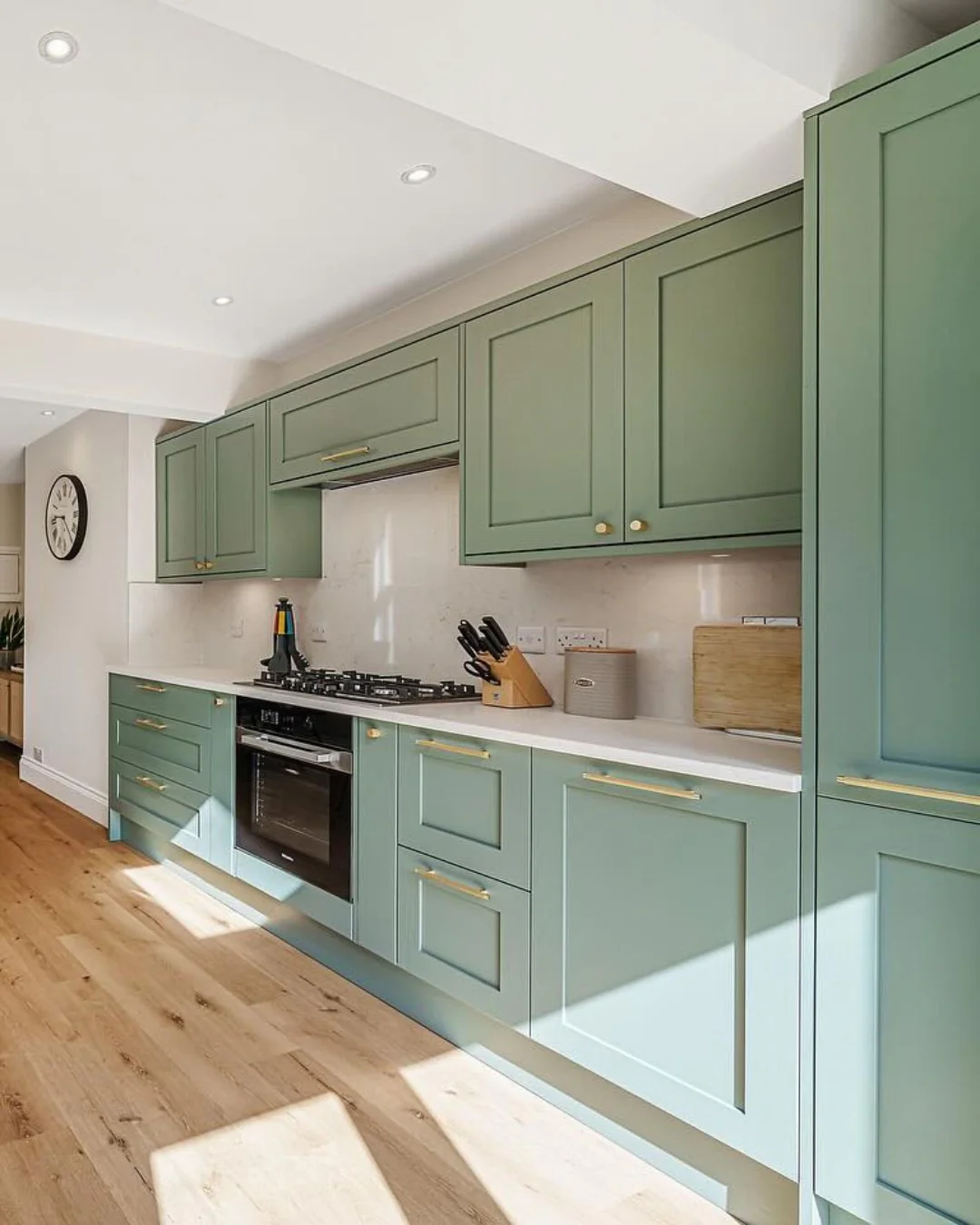 4. Soft Green Shaker Kitchen with Clean Lines (Long Narrow Kitchen Ideas)