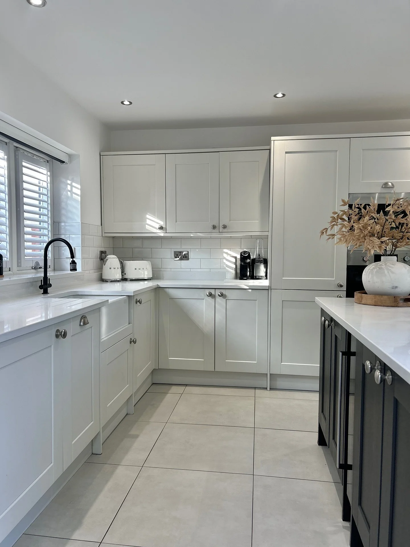 7. Modern White Kitchen with Graphic Contrast (Long Narrow Kitchen Ideas)