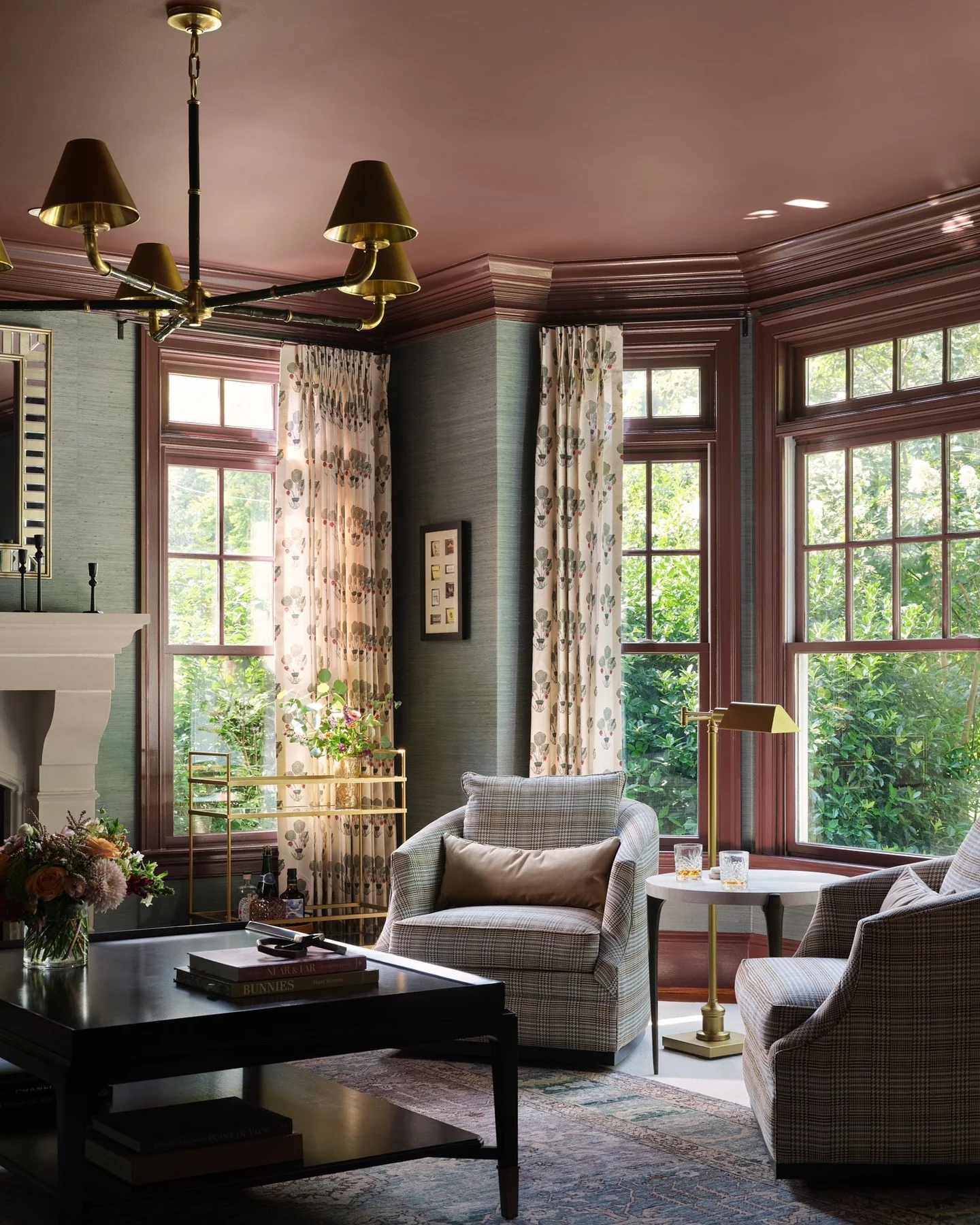 2. Moody Bay Window Conversation Area in Plum and Brass (Open Space Living Room Ideas)