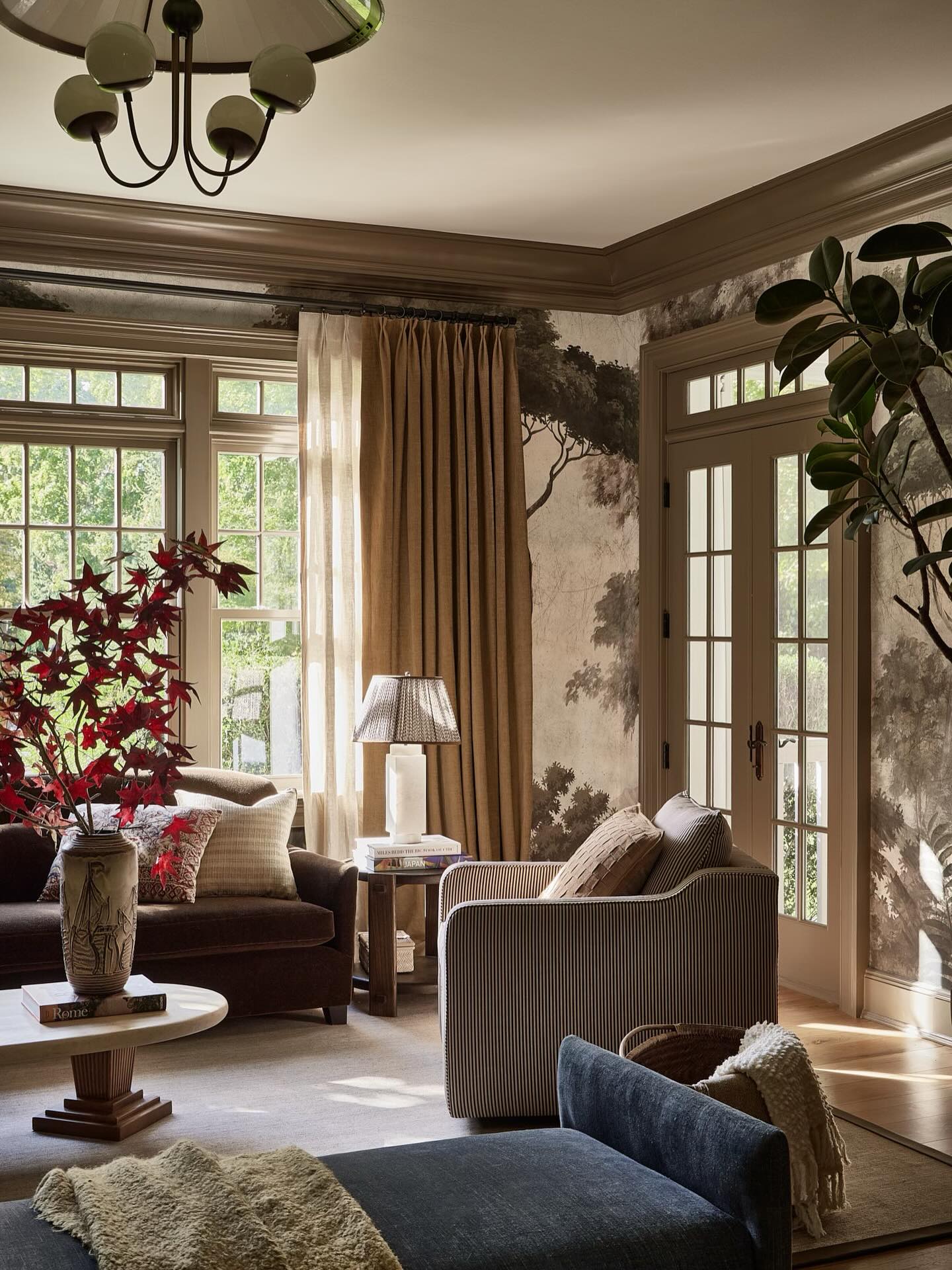 10. Elegant Nature-Inspired Sitting Room with Mural Walls (Open Space Living Room Ideas)