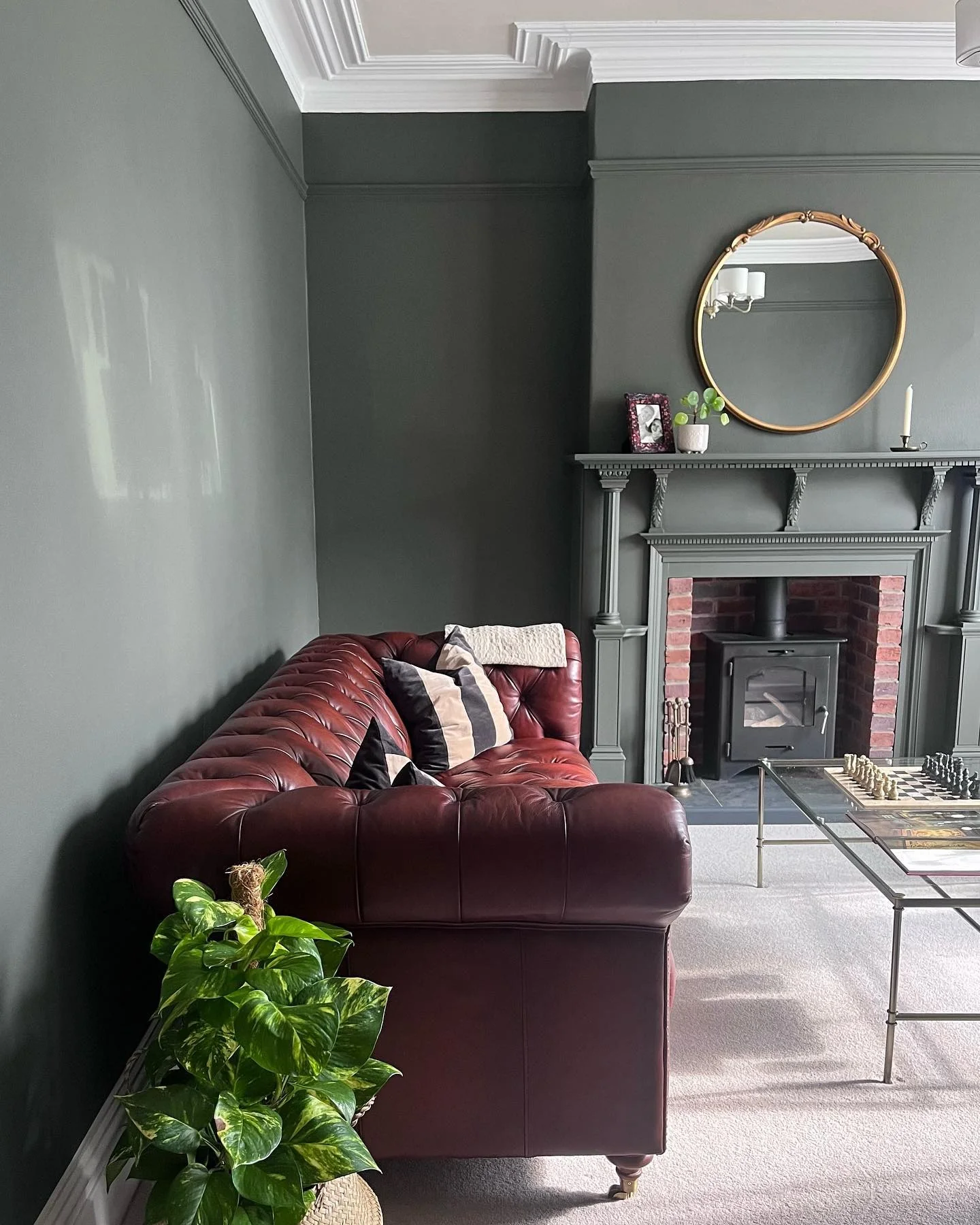 2. Charcoal Chic With Heritage Fireplace (Victorian Living Room Ideas)