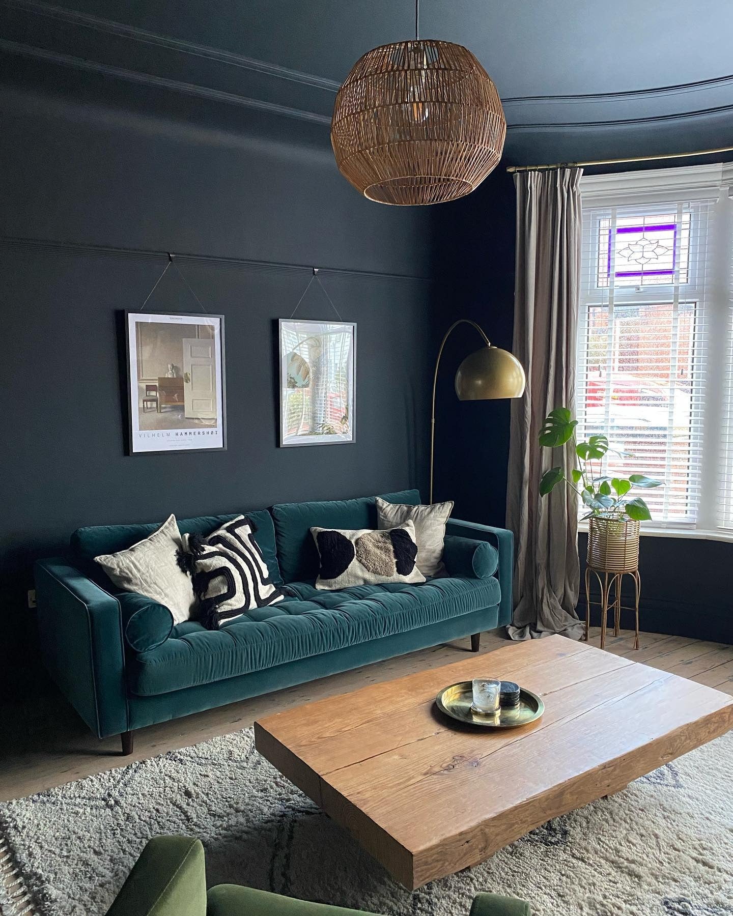 10. Ink-Dark Walls With Teal Velvet and Natural Wood (Victorian Living Room Ideas)