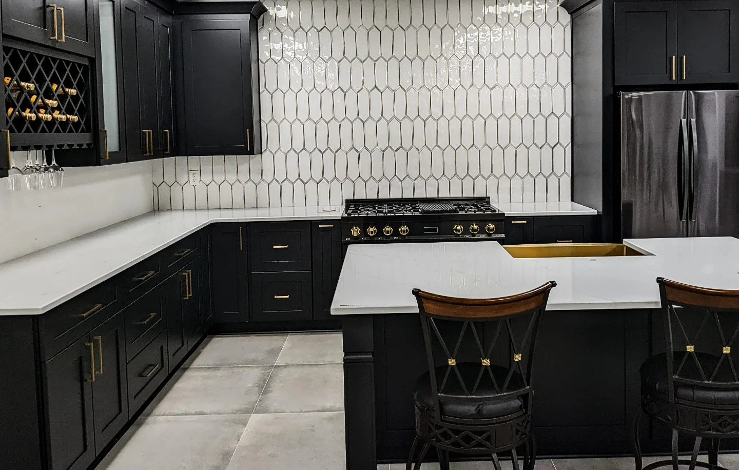 11. Elongated White Tile with Matte Black Cabinetry (Black and White Kitchen Backsplash Ideas)