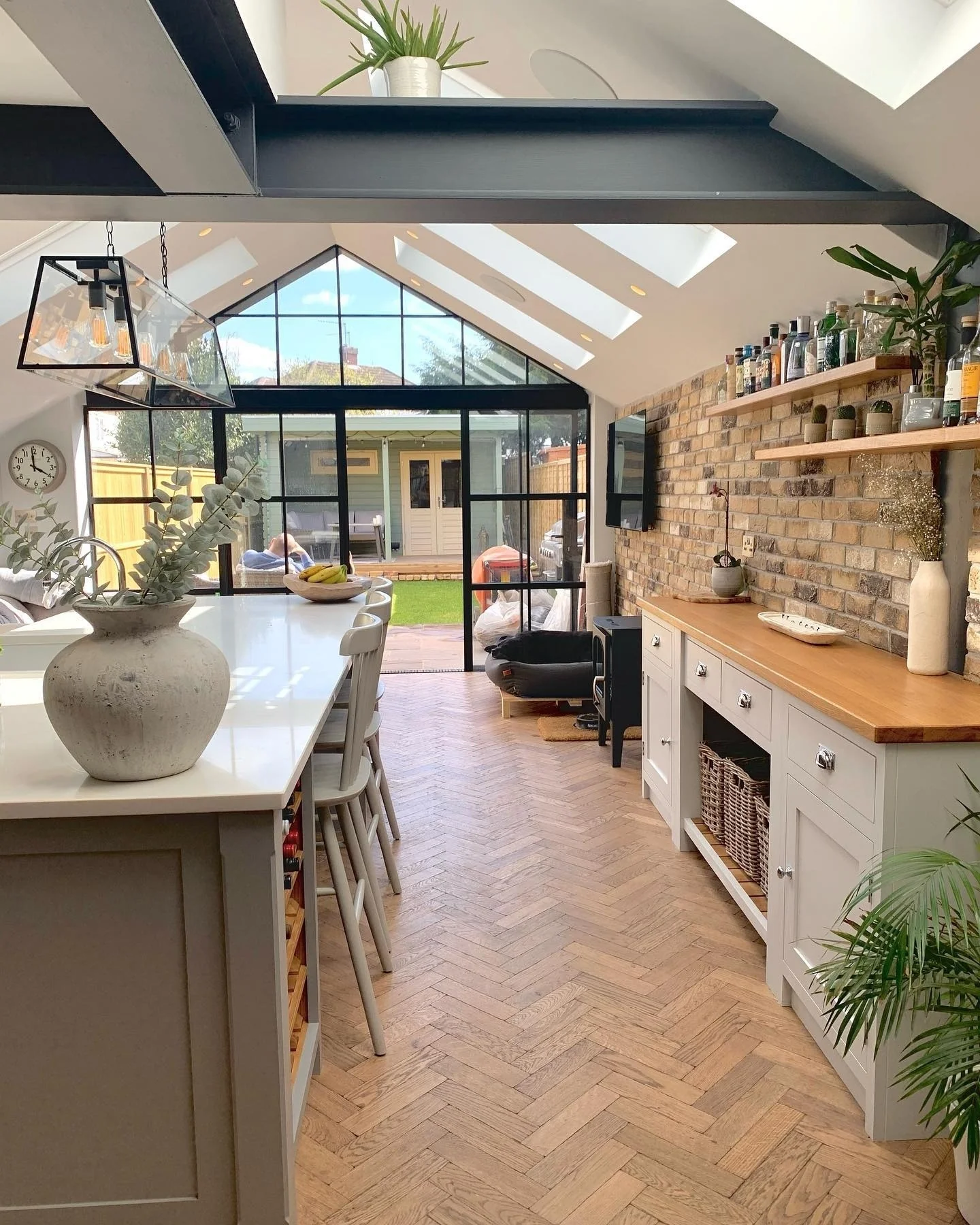 4. Light-Filled Extension with Brick Accent Wall (Open Plan Kitchen Ideas)