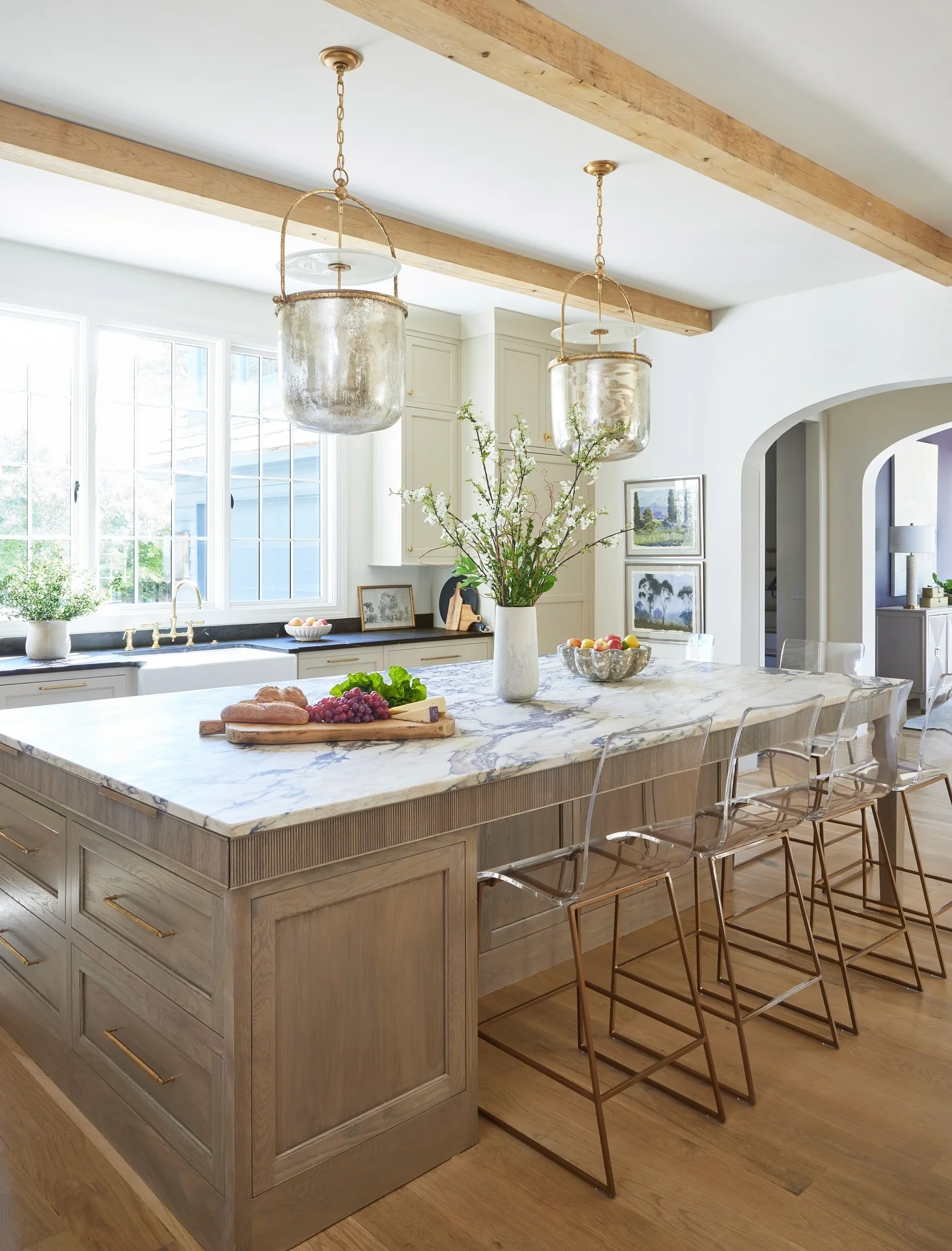 9. Marble Island Centerpiece with Organic Tone Woods (Open Plan Kitchen Ideas)