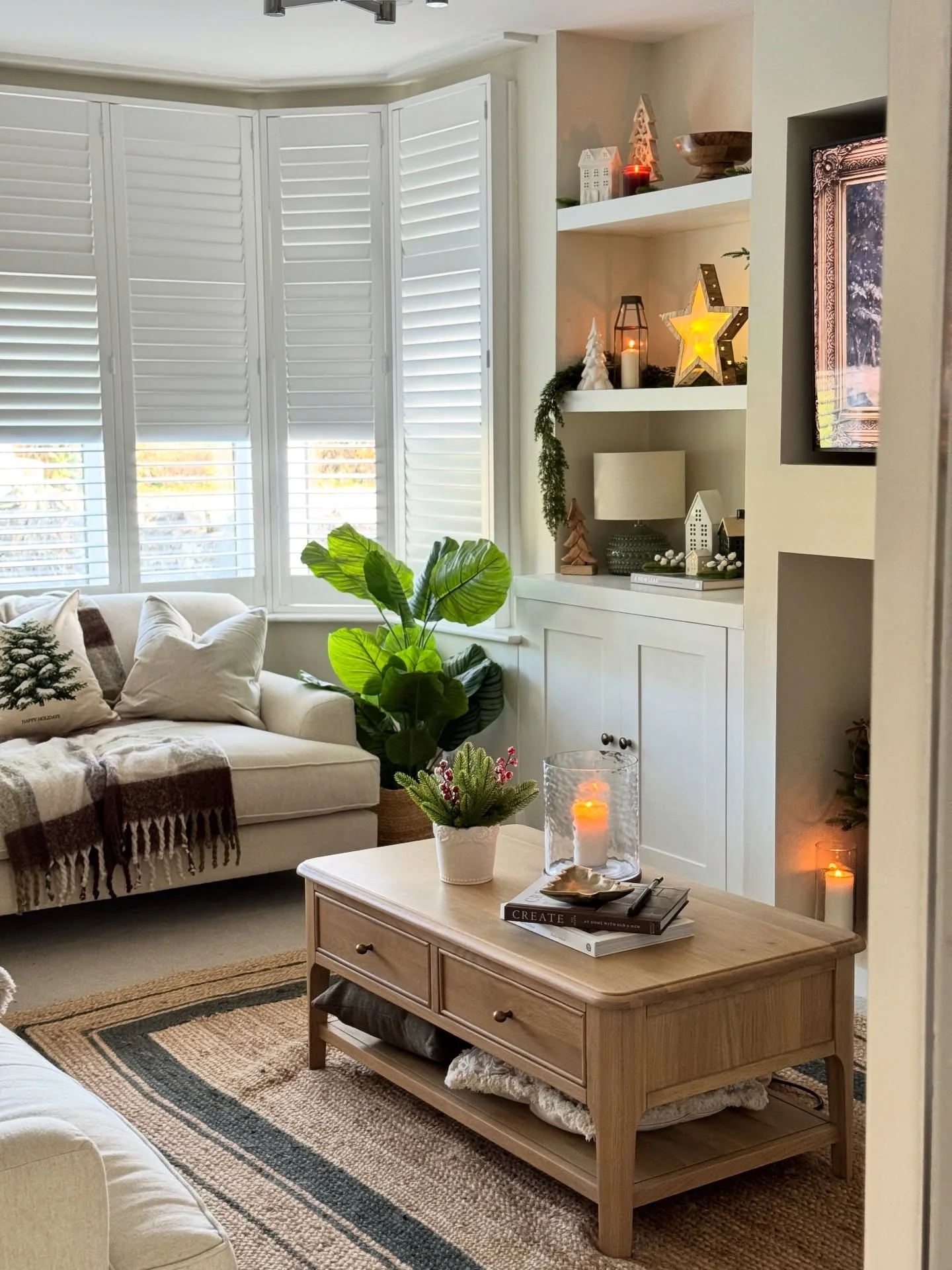 14. Cozy Cream Living Room With Built-In Shelves (Contemporary Small Living Room Ideas)