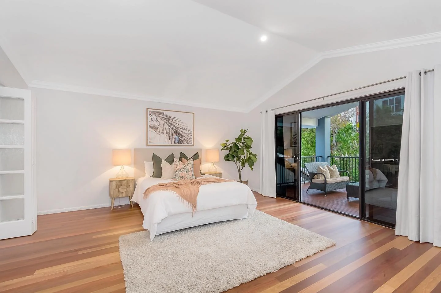 8. Airy Transitional Bedroom with Natural Light (Large Bedroom Ideas)