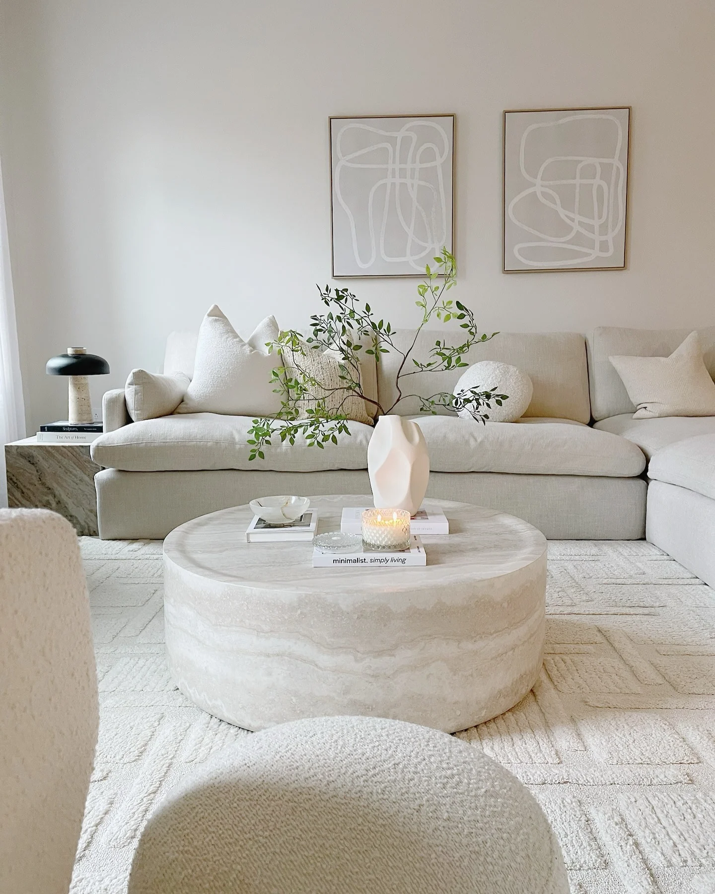 5. All-White Minimal Living Area With Sculptural Greenery (Living Room Decor Ideas)