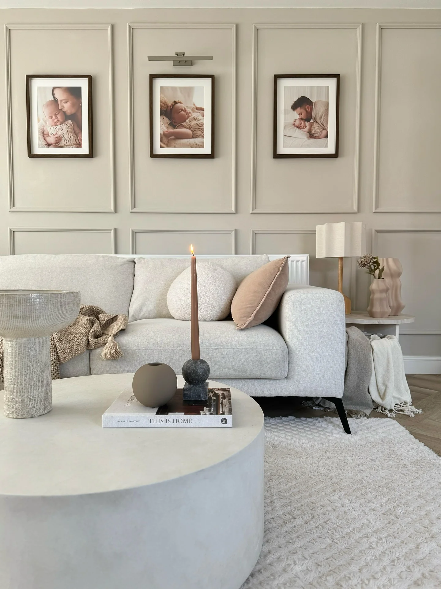 9. Gallery-Wall Living Room With Light Paneling and Soft Neutrals (Living Room Decor Ideas)